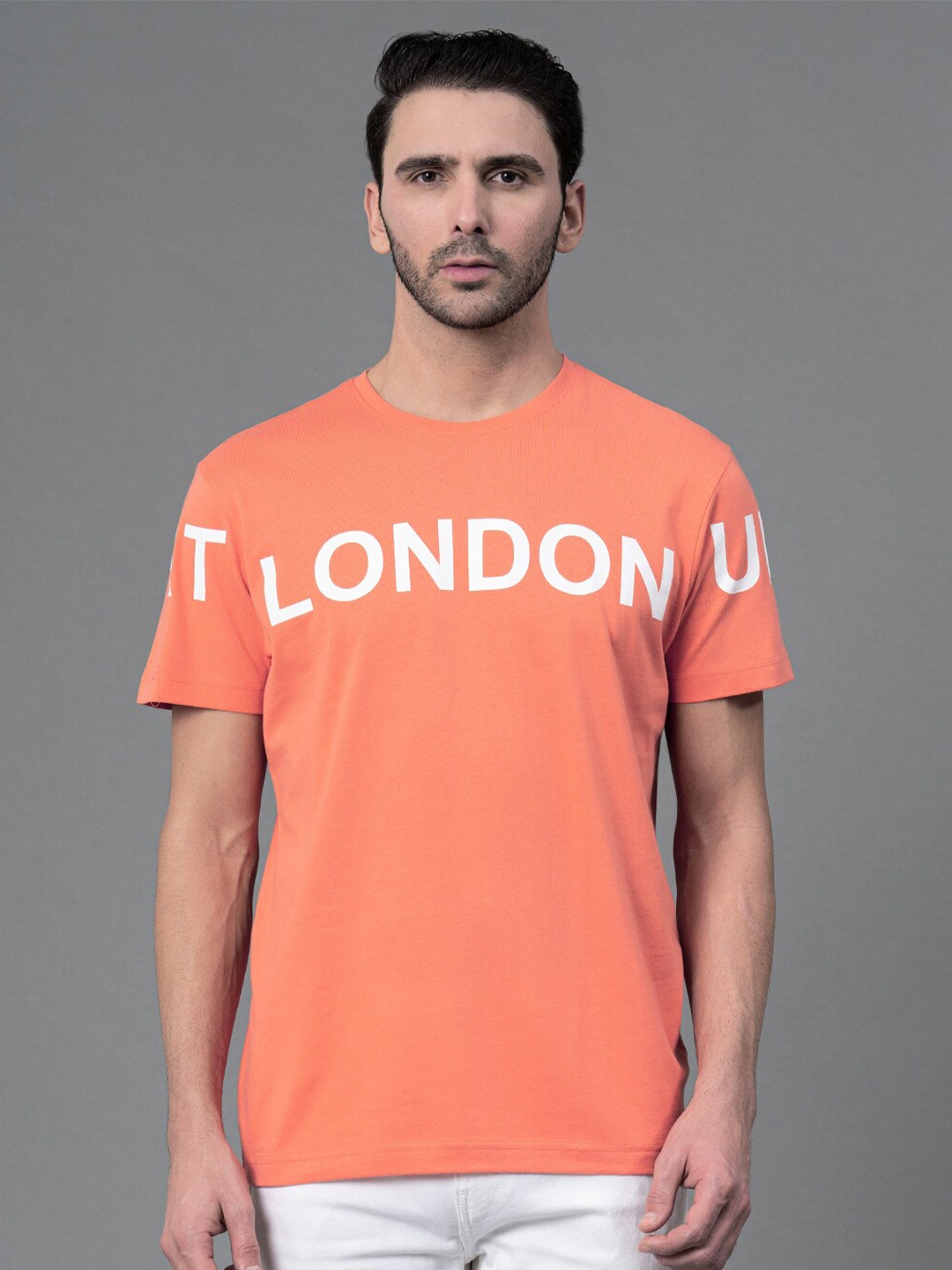 

Red Tape Men Typography Printed Pure Cotton T-shirt, Orange