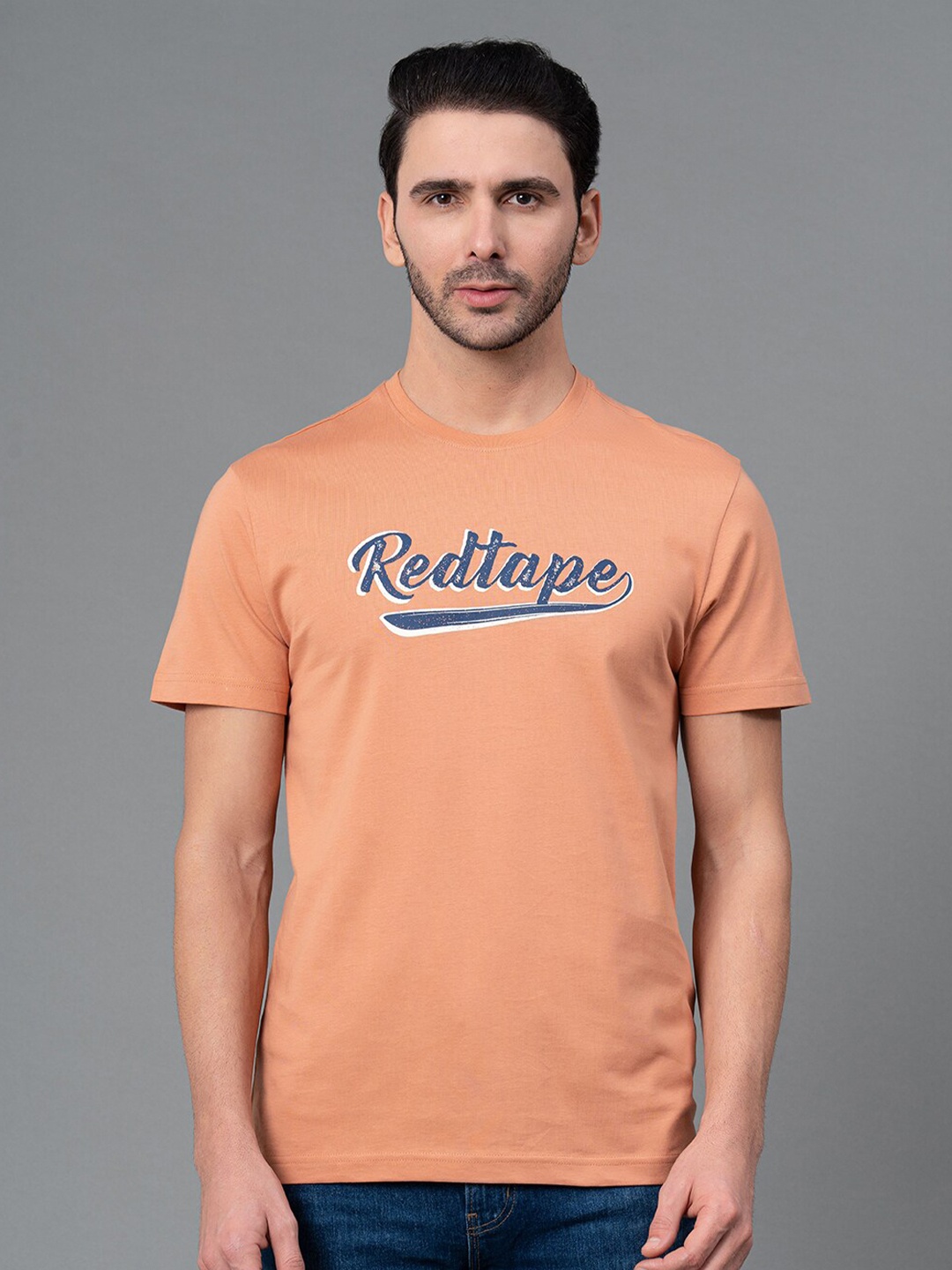 

Red Tape Men Graphic Print 100% Cotton Round Neck Half Sleeve T-Shirt, Orange
