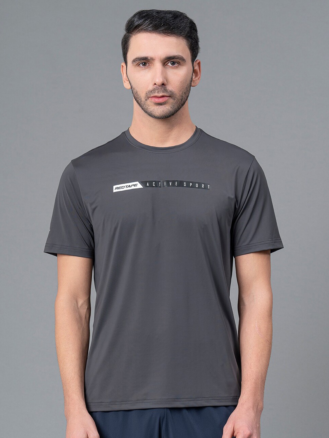 

Red Tape Men Brand Logo Printed Activewear T-shirt, Grey