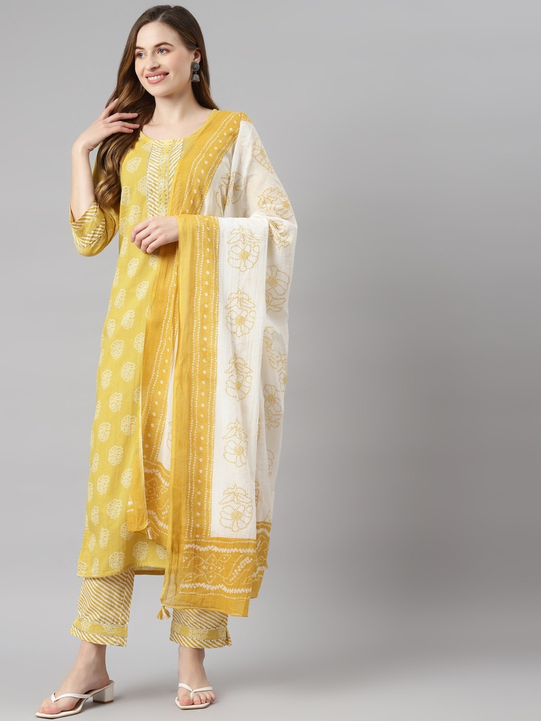 

Readiprint Fashions Women Printed Round Neck Pure Cotton Kurta with Trousers & Dupatta, Yellow