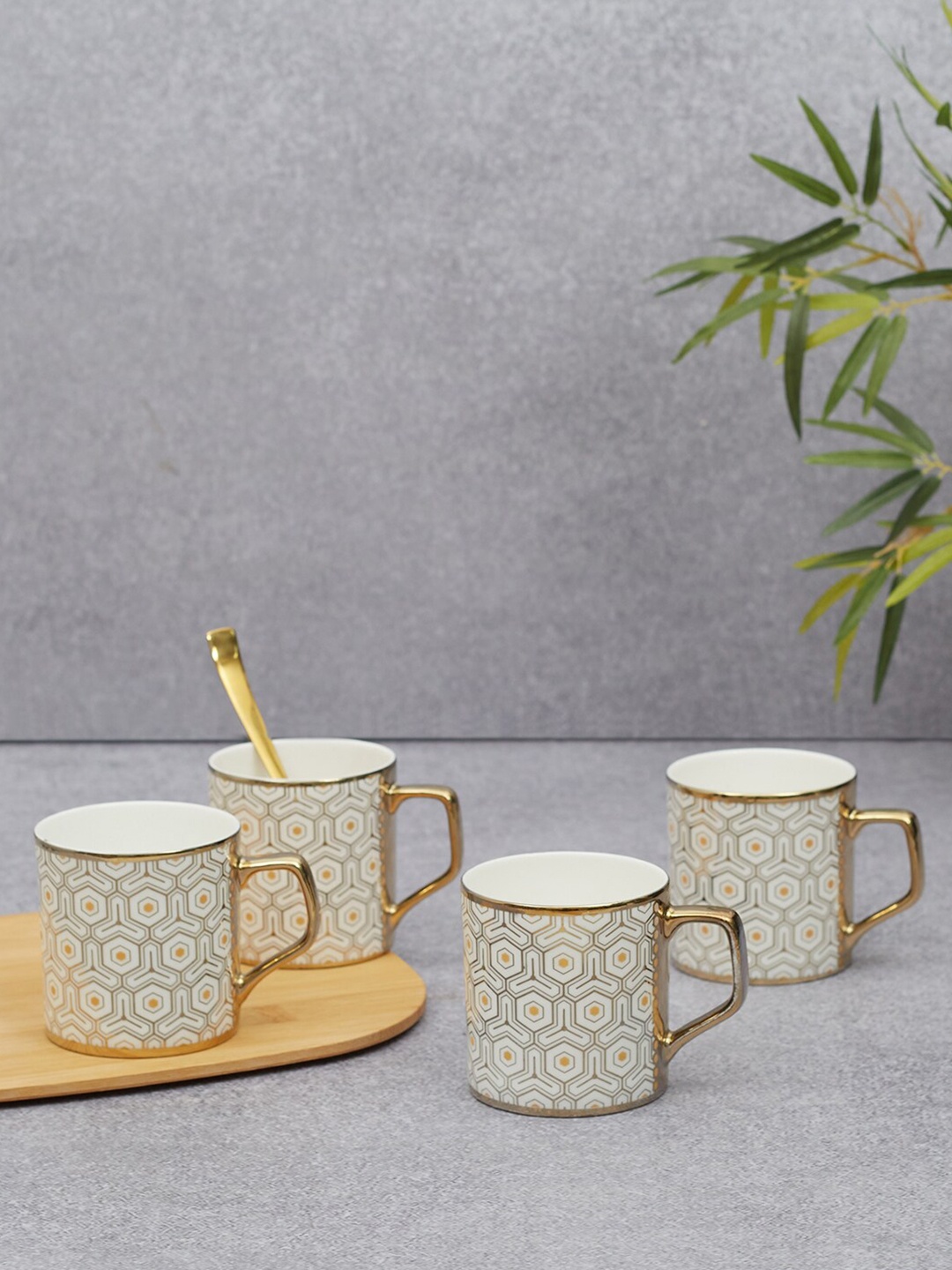 

HomeTown Sapphire 4 Pcs White & Yellow Printed Bone China Glossy Tea Mugs 220 ml each