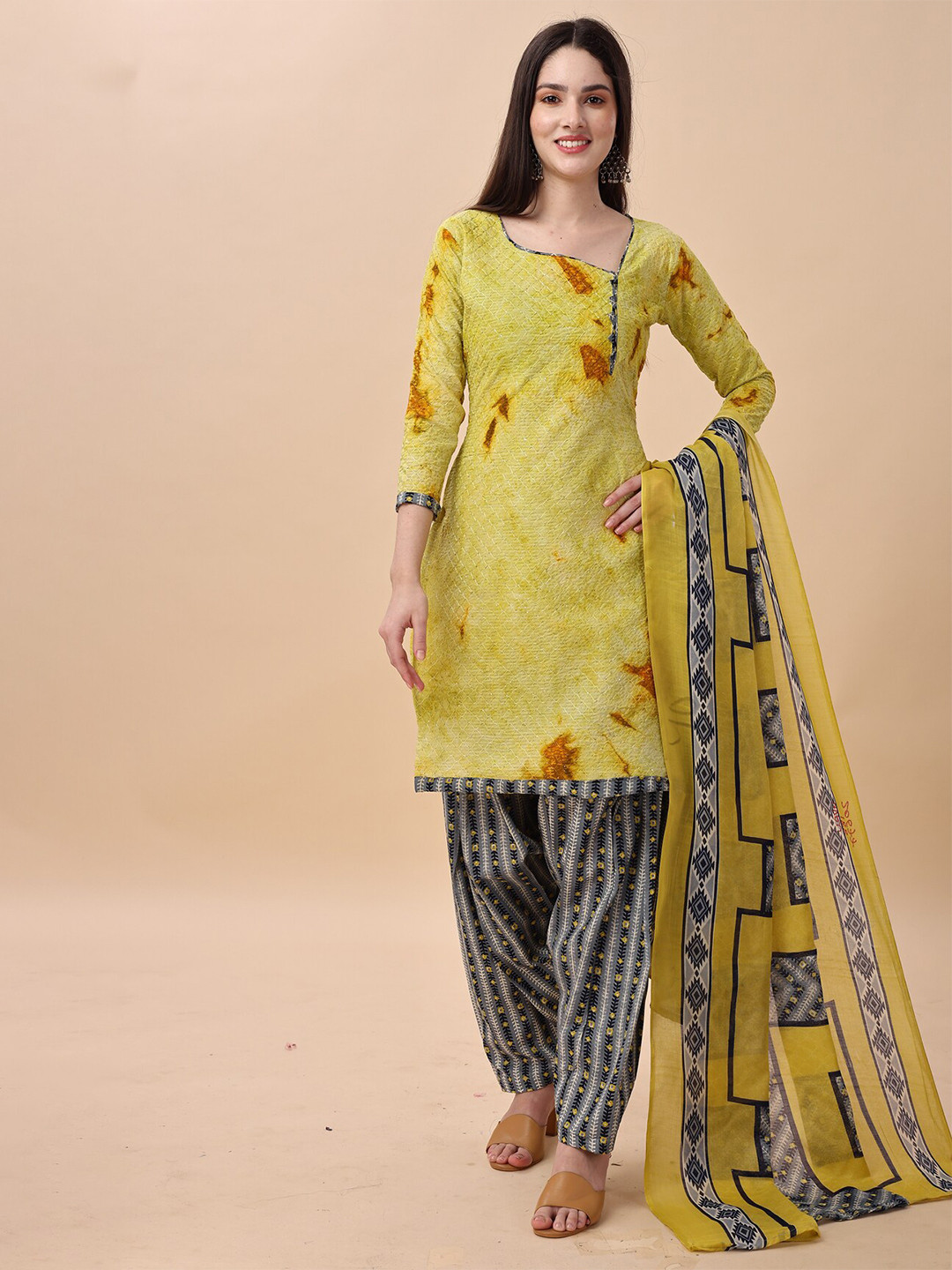 

Rajnandini Abstract Printed Pure Cotton Unstitched Dress Material, Yellow