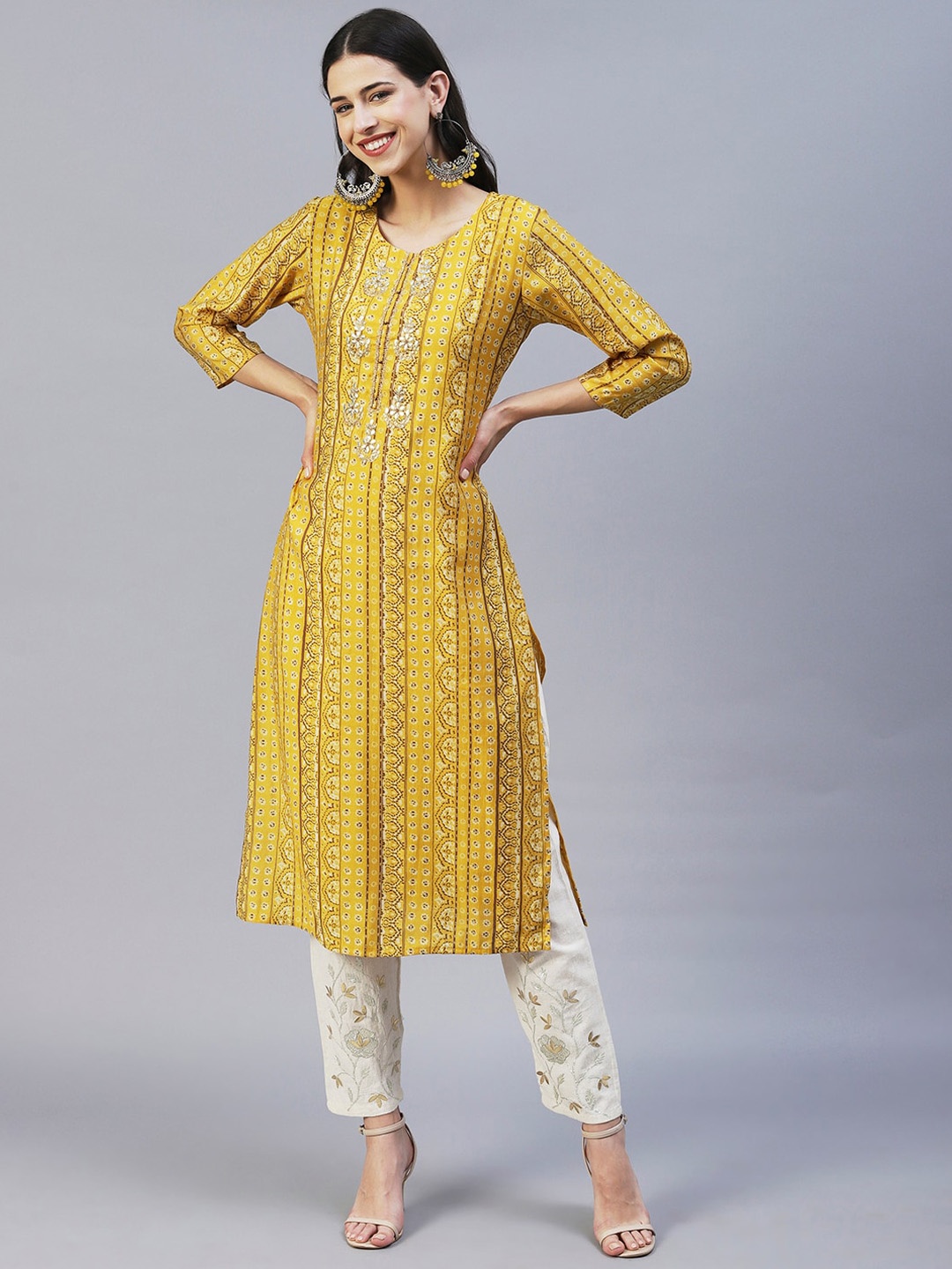 

FASHOR Women Printed Round Neck Sequinned Kurta, Yellow