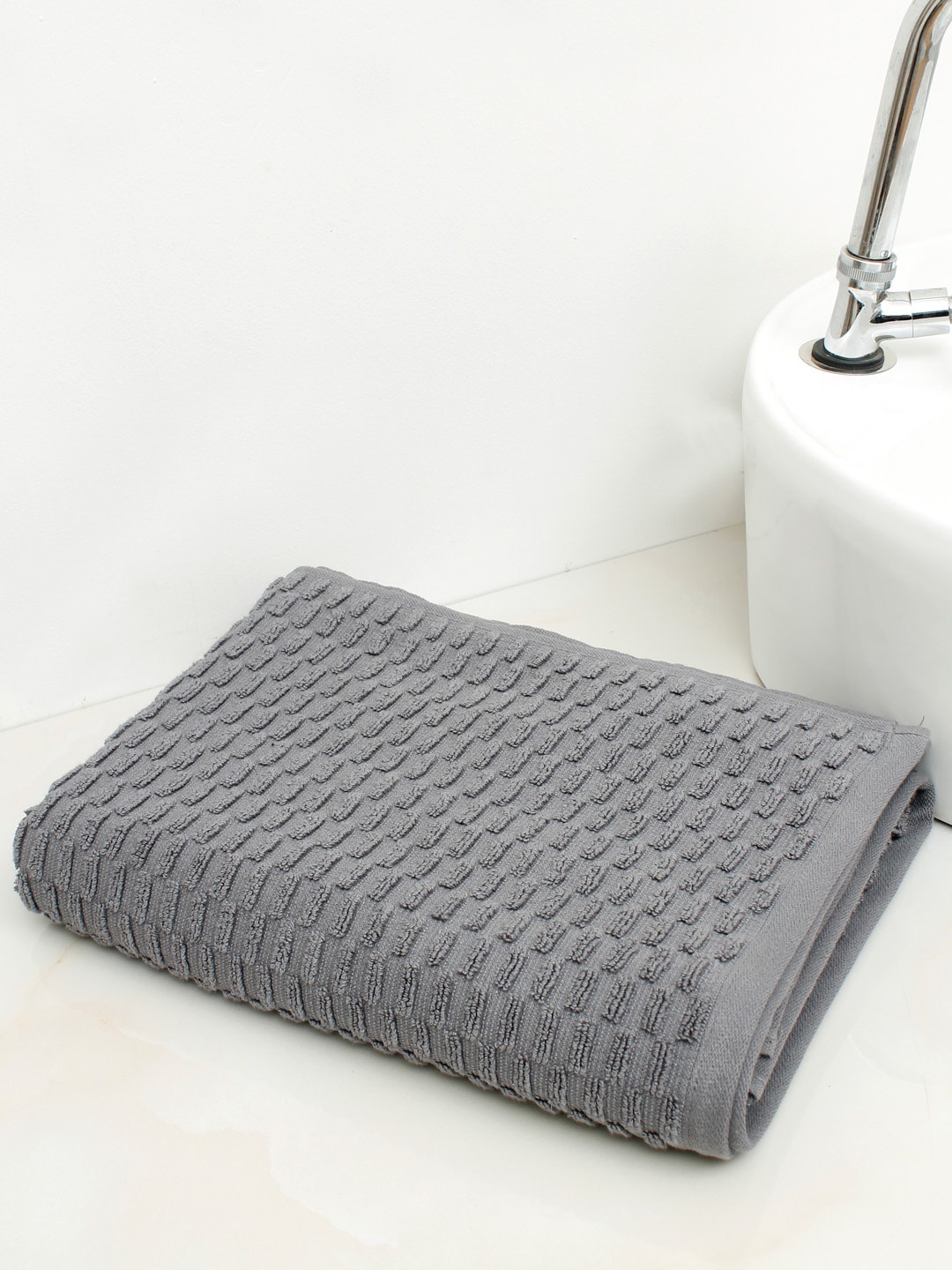

AVI Living Brick Grey Textured 500 GSM Pure Cotton Bath Towel