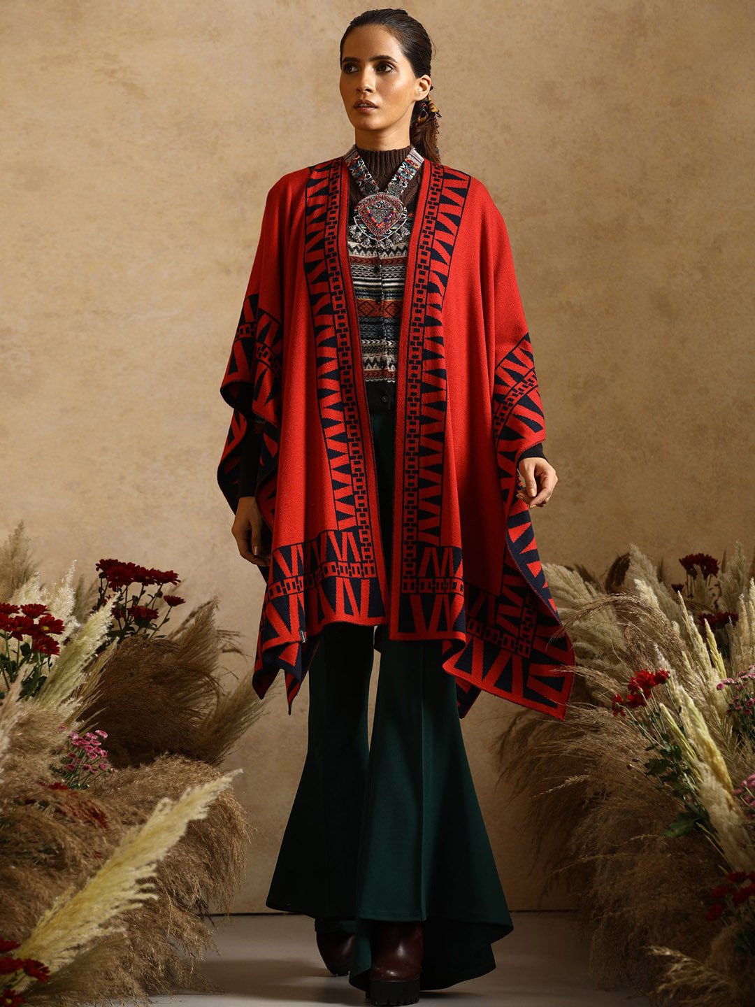 

KHALEEJ Women Geometric Asymmetric Longline Poncho Jacket, Red