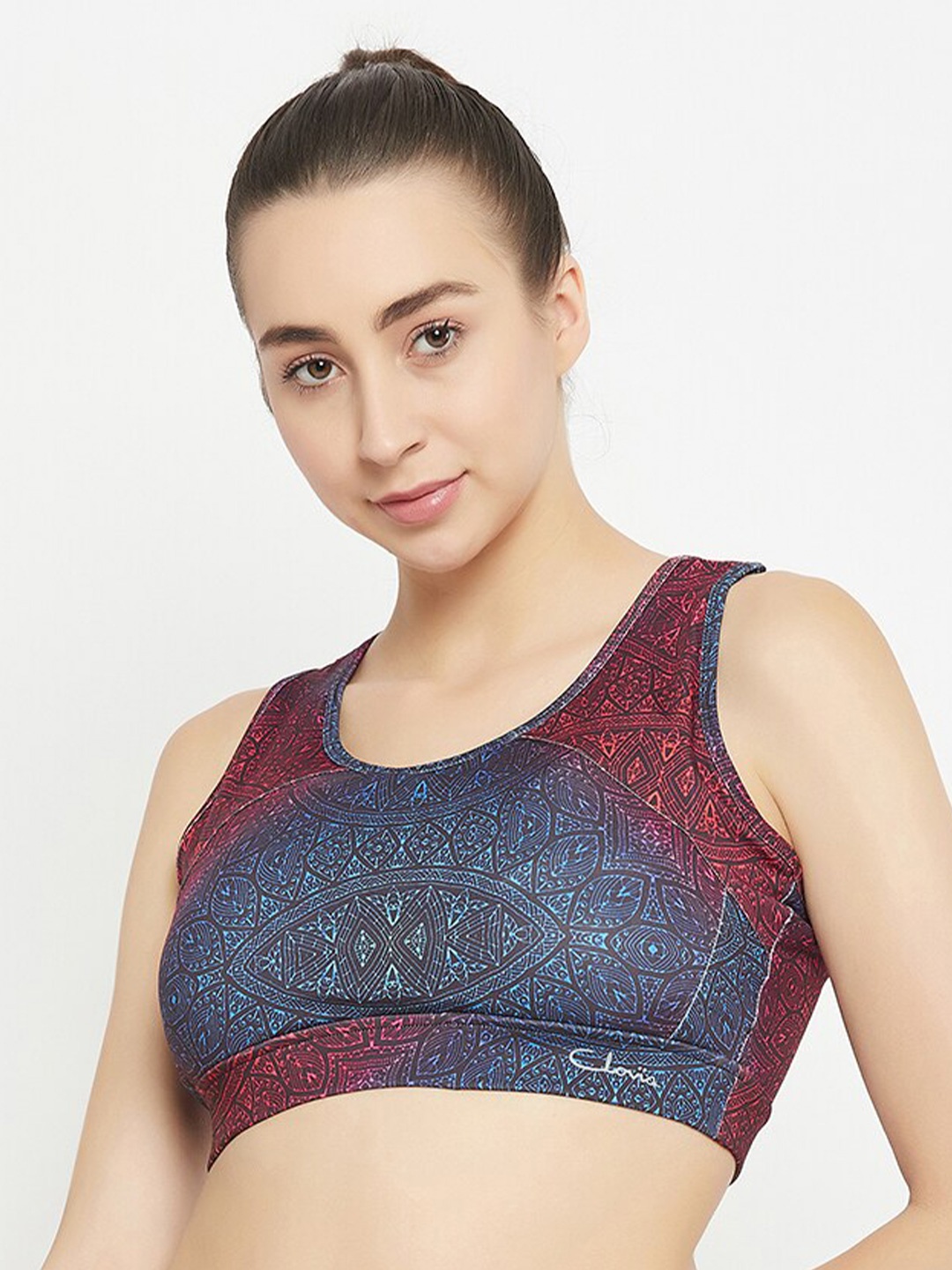 

Clovia Medium Impact Padded Geometric Print Racerback Sports Bra, Blue