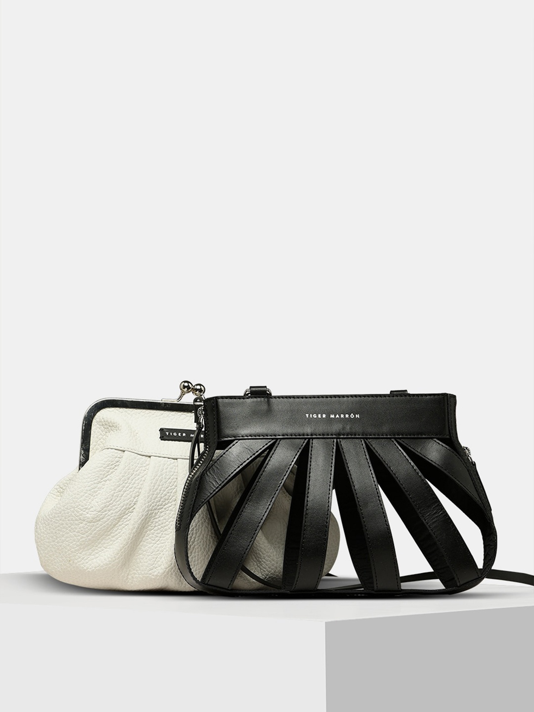 

TIGER MARRON Striped Vegan Leather Bowling Sling Bag, Black