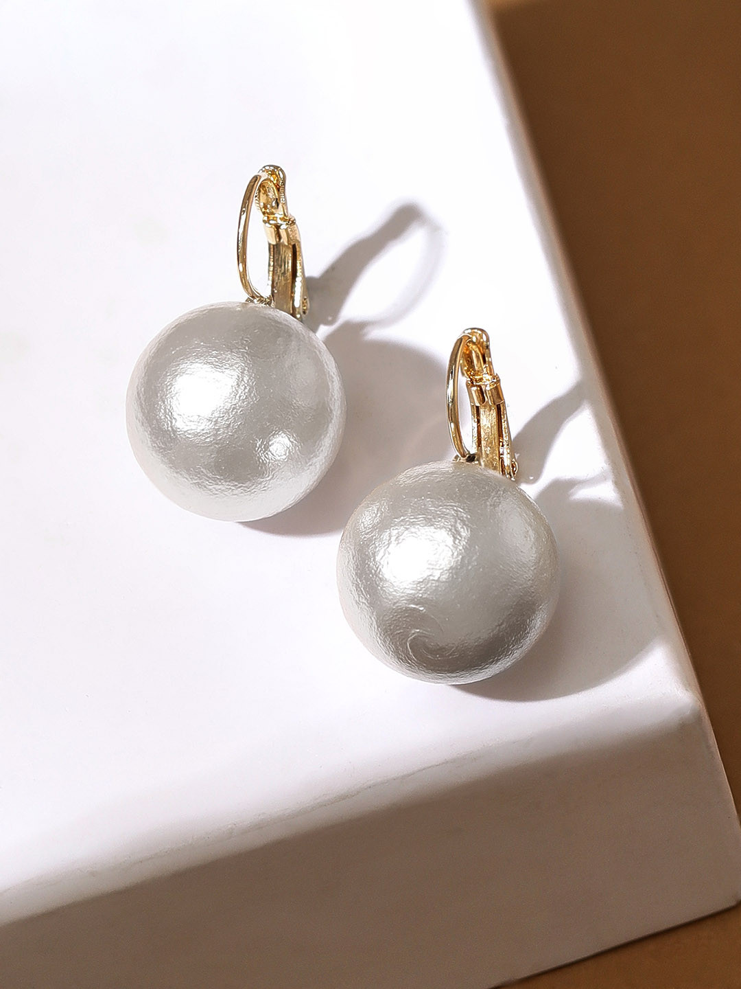 

Rubans Voguish Gold Plated Pearl Studded Circular Drop Earrings