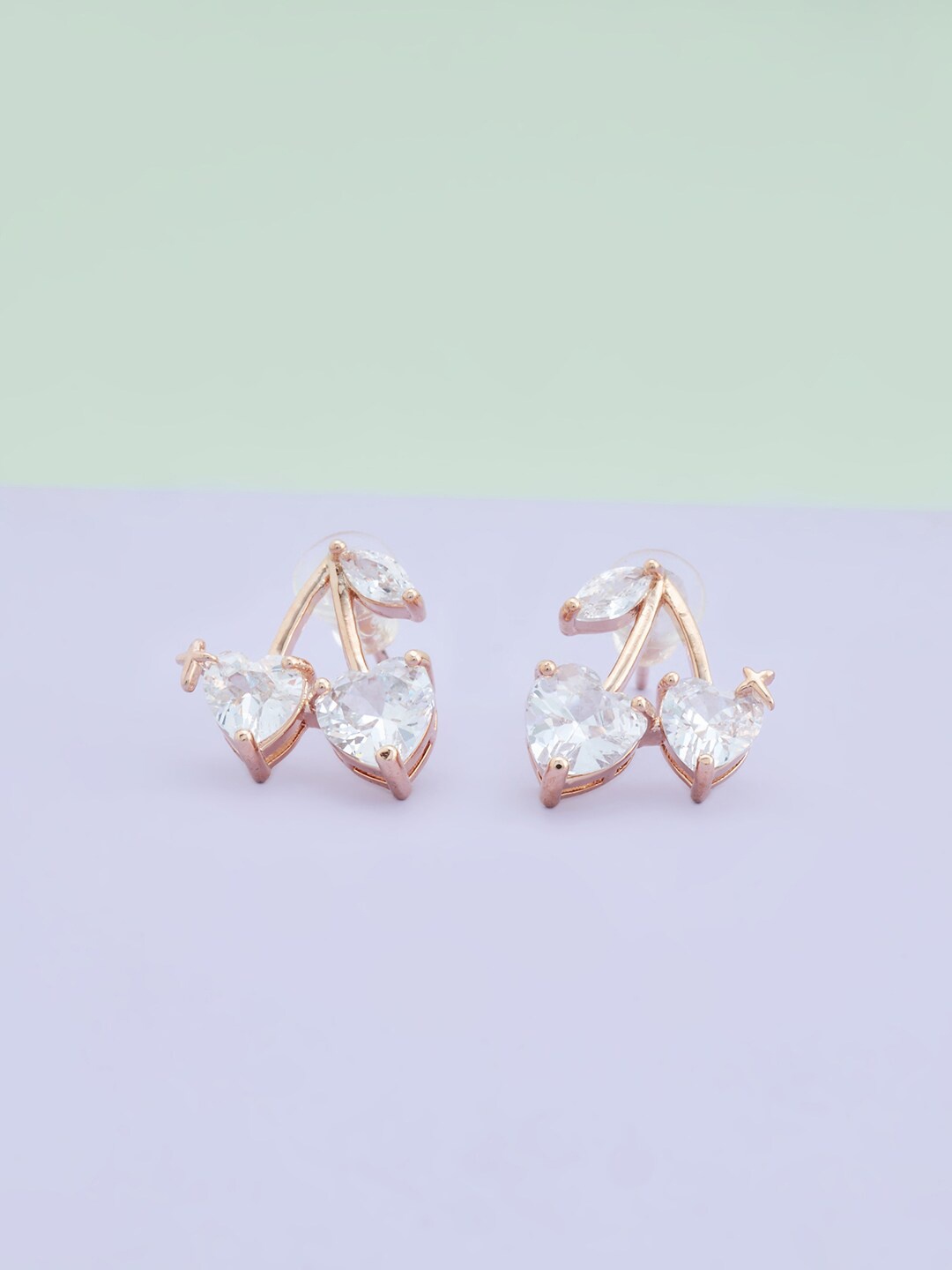 

Kushal's Fashion Jewellery Rose-Gold Plated Leaf Shaped Studs Earrings, White