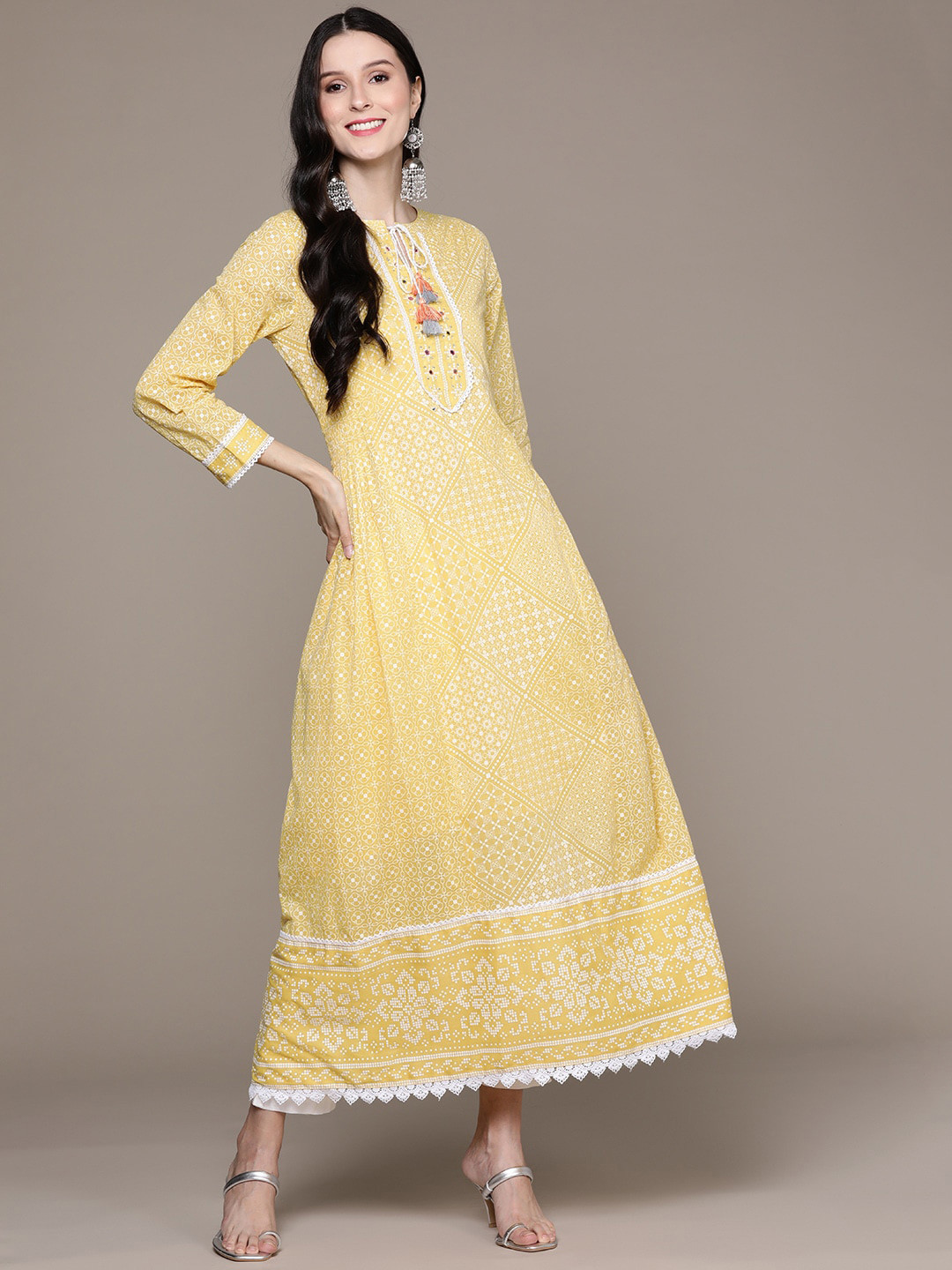 

Ishin Women Ethnic Motifs Printed Pastels Kurta, Yellow