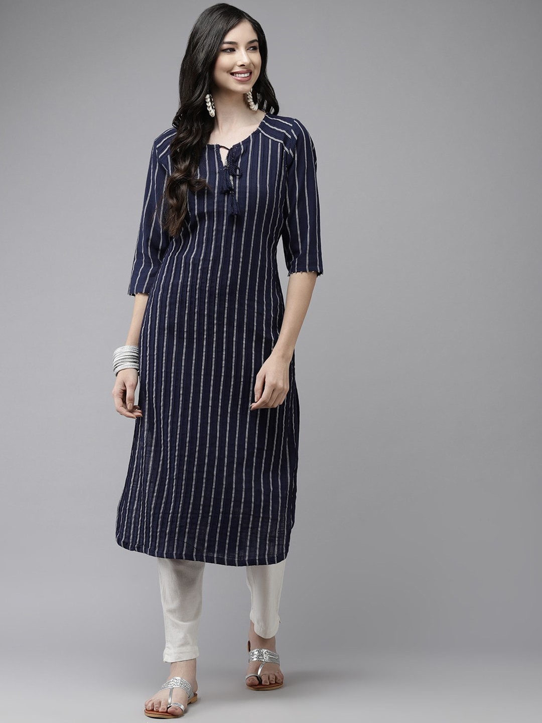 

Ishin Women Striped Tie-Up Neck Pure Cotton Kurta, Navy blue