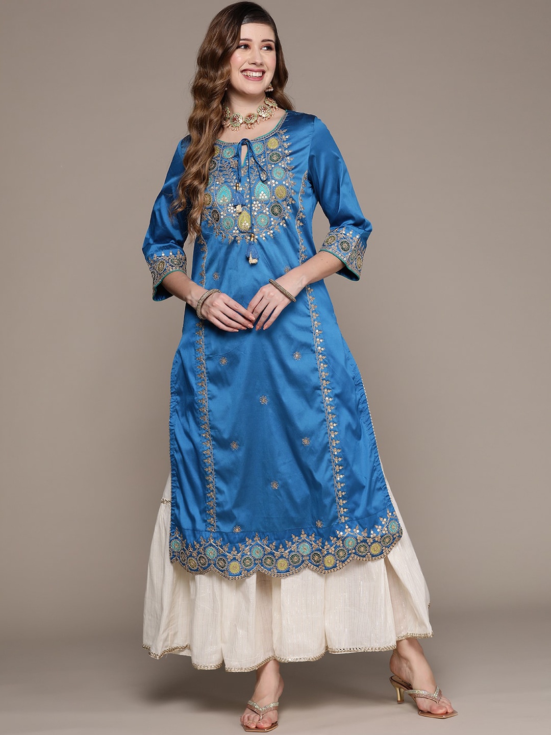 

Ishin Women Ethnic Motifs Embroidered Tie-Up Neck Kurta, Blue