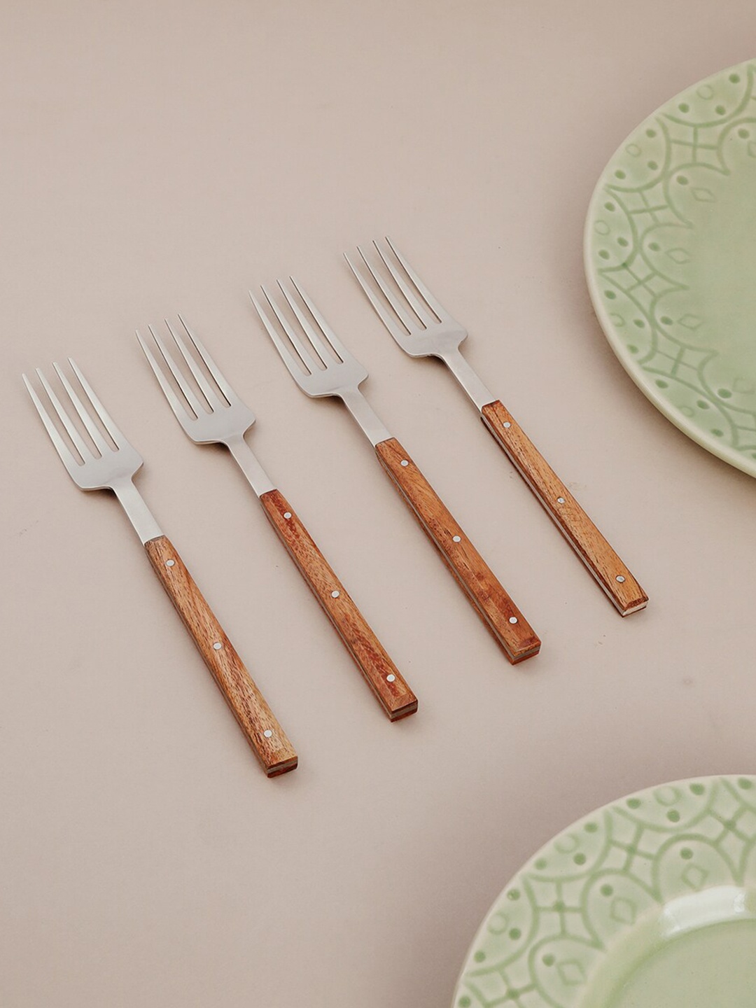 

Fabindia Natural Aakarik 4 Pieces Brown Dinner Forks