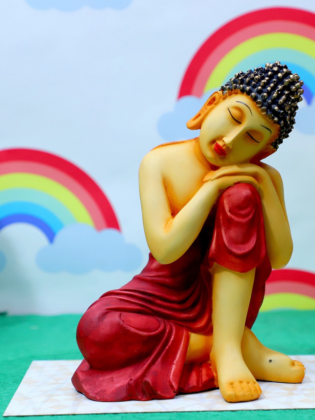 

FASHIYANOO Red & Yellow Relaxing Position Buddha Idol Showpiece