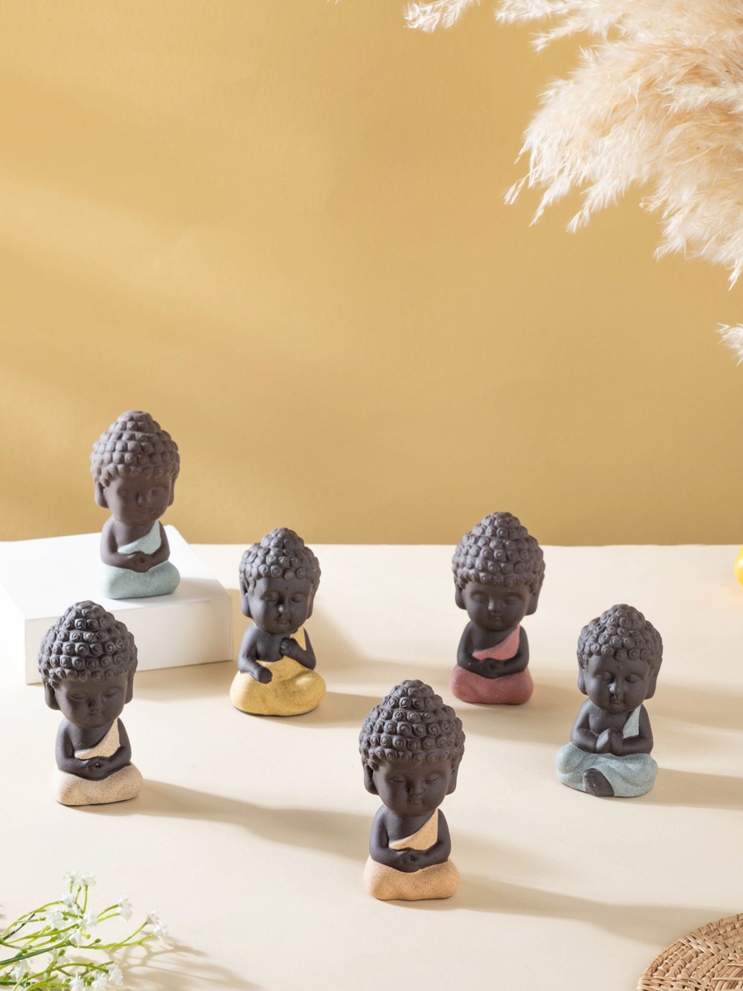 

Nestasia Black & Yellow 6 Pcs Clay Monk Figurine Showpiece