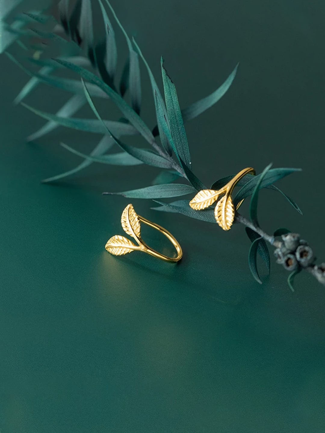 

Raajsi by Yellow Chimes 925 Sterling Silver Gold Plated Leaf Shaped Studs Earrings