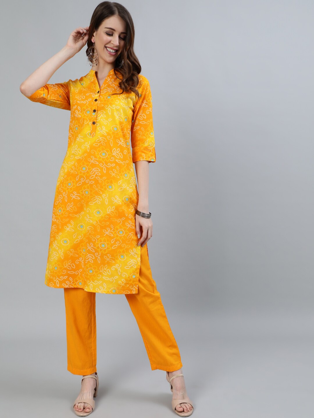 

Ishin Women Mandarin Colla Bandhani Printed Pure Cotton Kurta with Trousers, Mustard