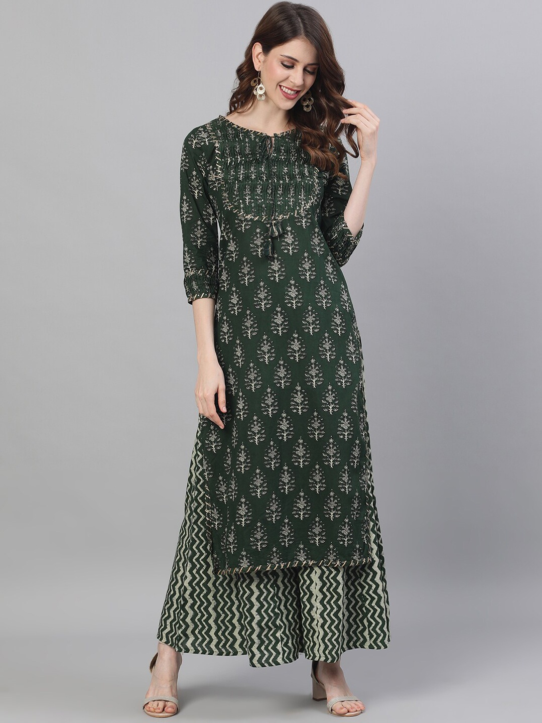 

Ishin Women Printed Tie Up Neck Gotta Patti Pure Cotton Kurta with Palazzos, Green