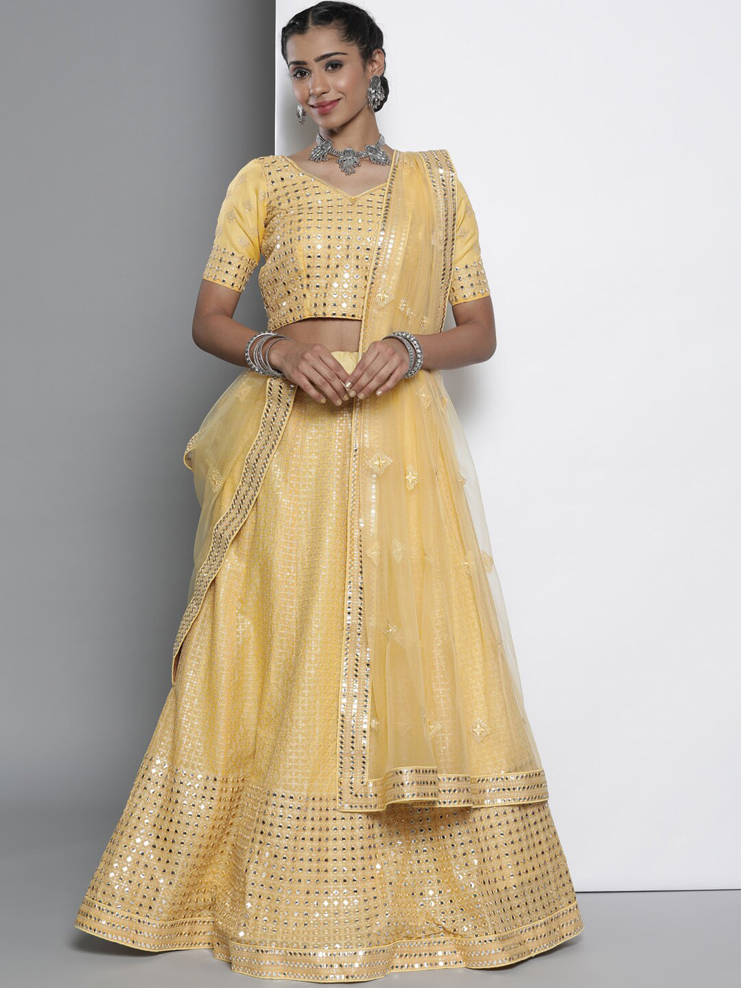 

Fusionic Embroidered Mirror Work Semi-Stitched Lehenga & Unstitched Blouse With Dupatta, Yellow
