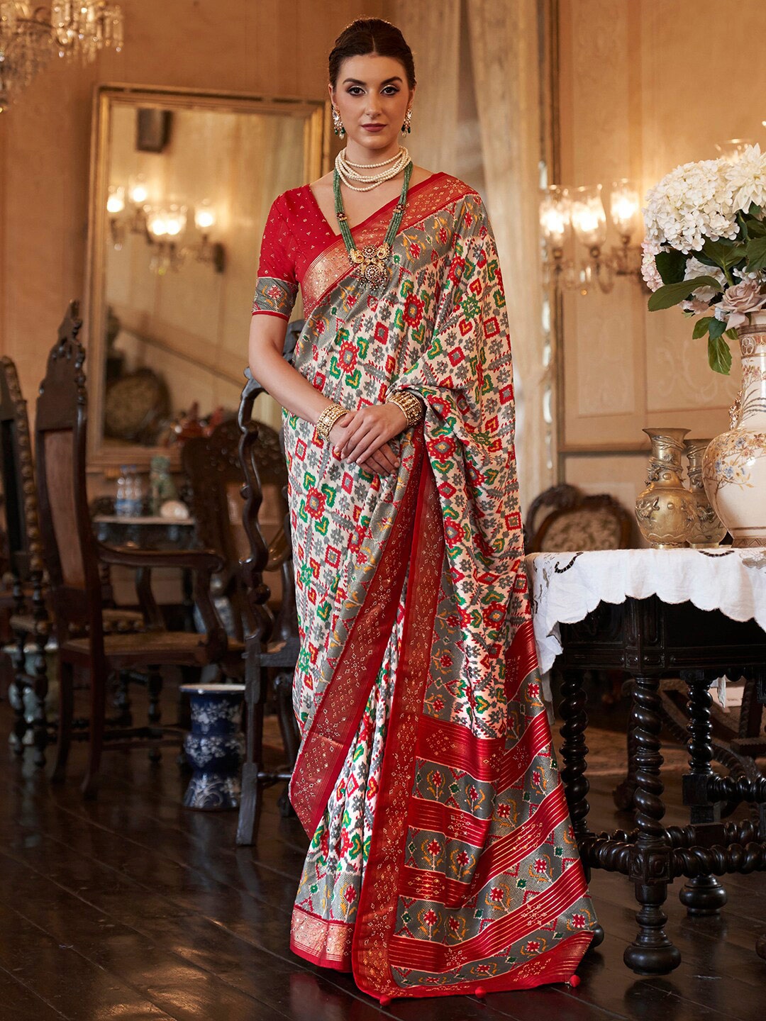 

Anouk Ethnic Motifs Printed Zari Patola Saree, Cream