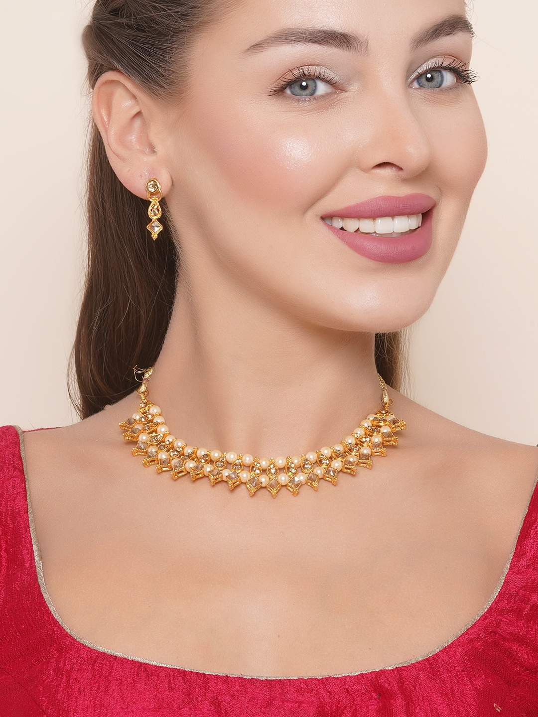 

Anouk Gold-Plated Stones Studded & Pearls Beaded Jewellery Set