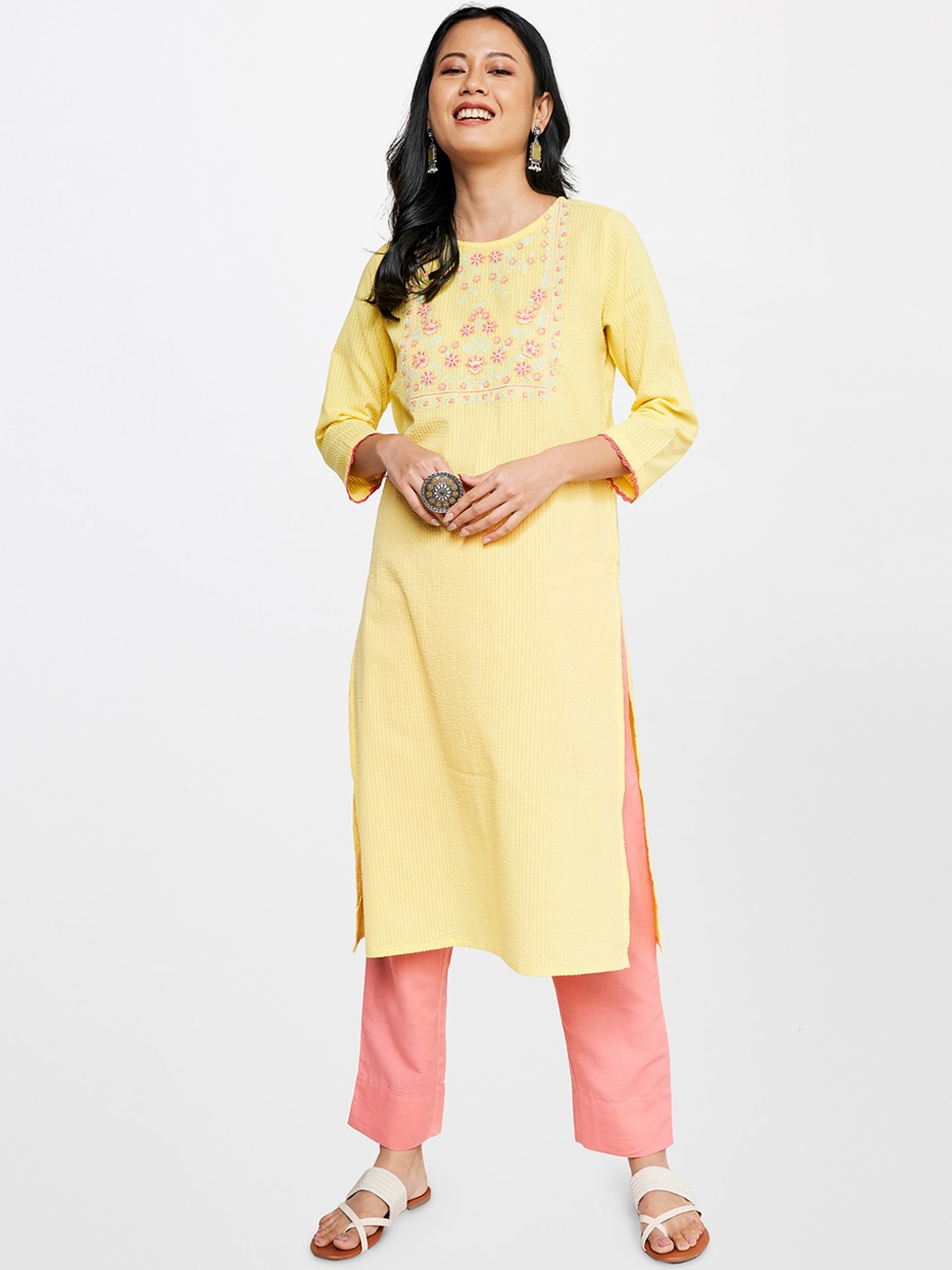 

Global Desi Women Yoke Design Thread Work Cotton Kurta, Yellow