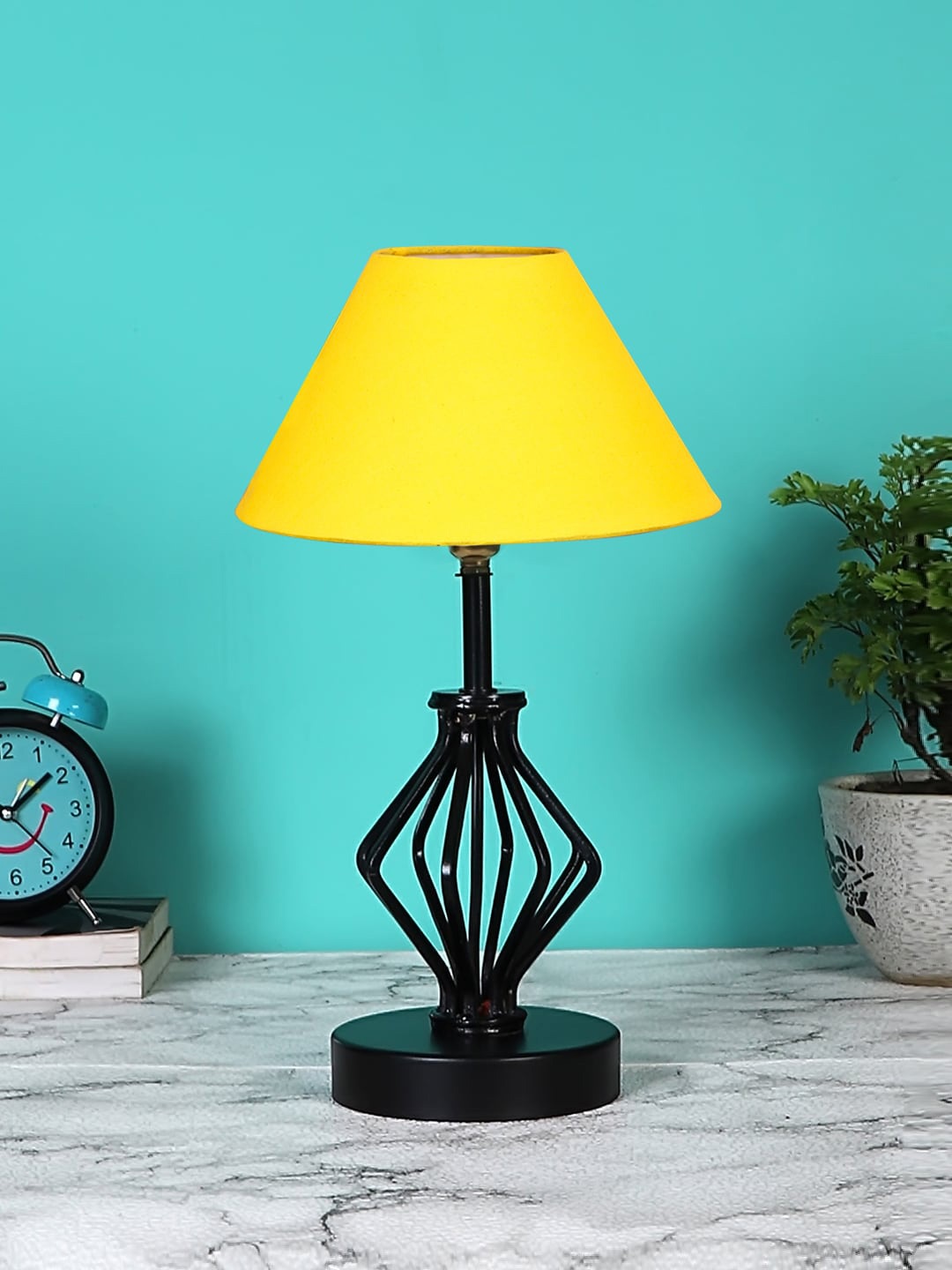 

Devansh Yellow & Black Textured Cotton Table Lamp With Iron Base