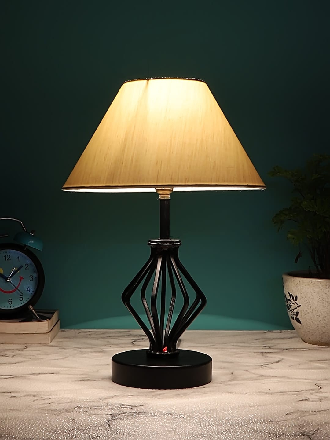 

Devansh Off White & Black Textured Cotton Shade Table Lamp With Iron Base