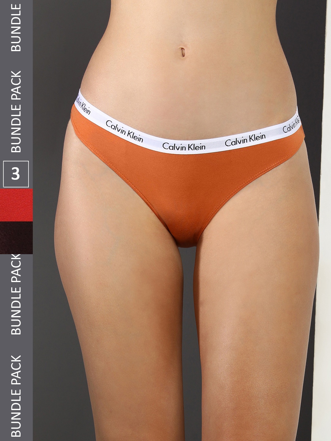 

Calvin Klein Underwear Pack Of 3 Mid-Rise Seamless Bikini Briefs QD3588BOV, Orange