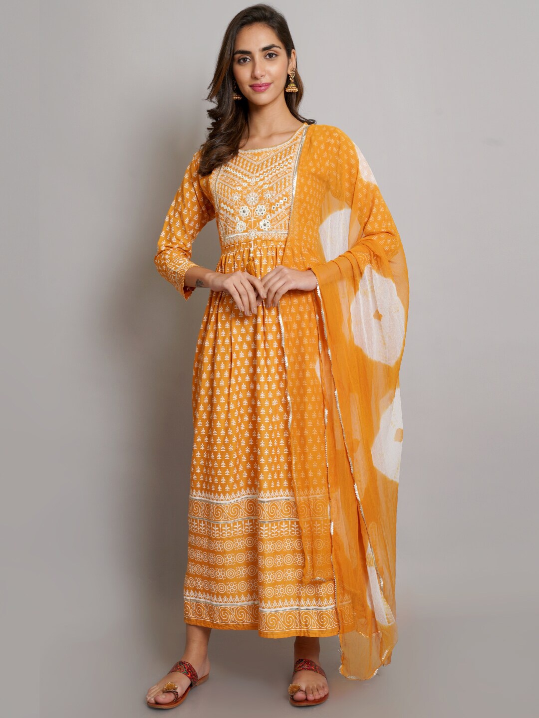 

Risirioutfit Floral Printed Pleated Mirror Work Pure Cotton Kurta Set, Yellow