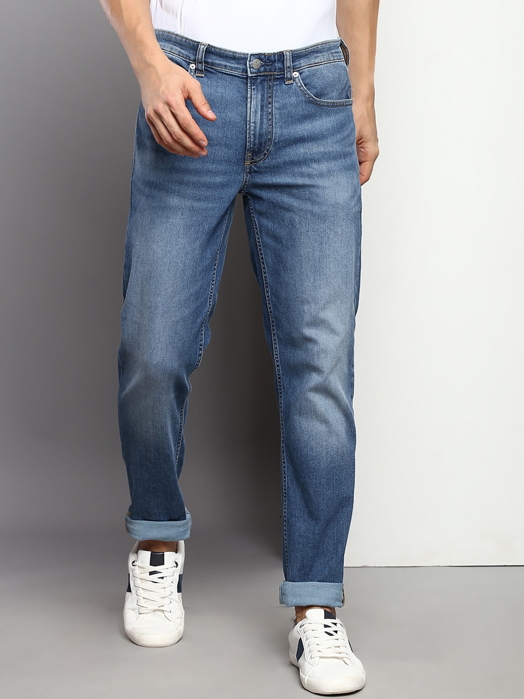 

Calvin Klein Jeans Men Tapered Fit Light Fade Jeans, Blue