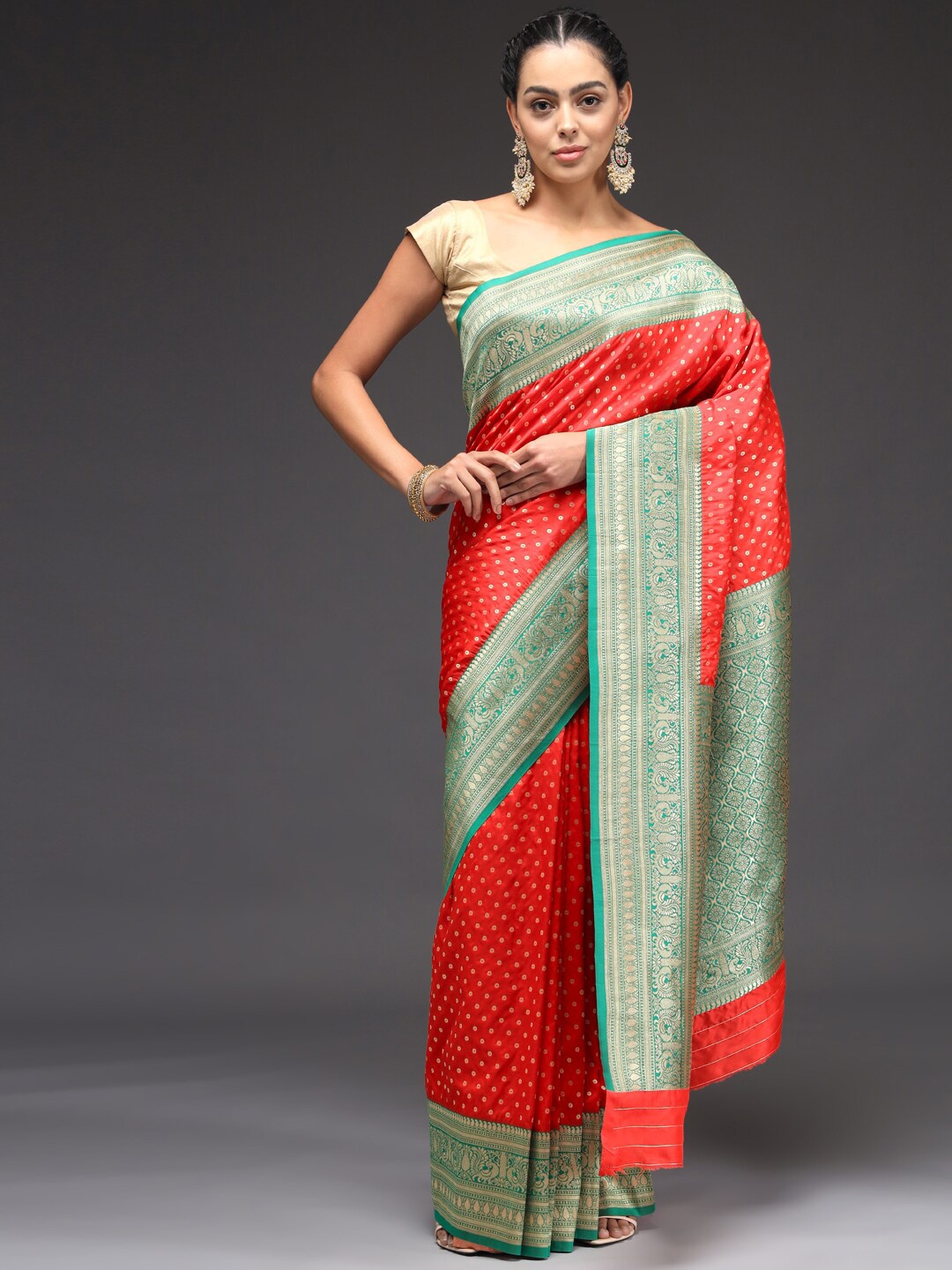 

Sitaram Designer Orange & Green Woven Design Zari Art Silk Saree