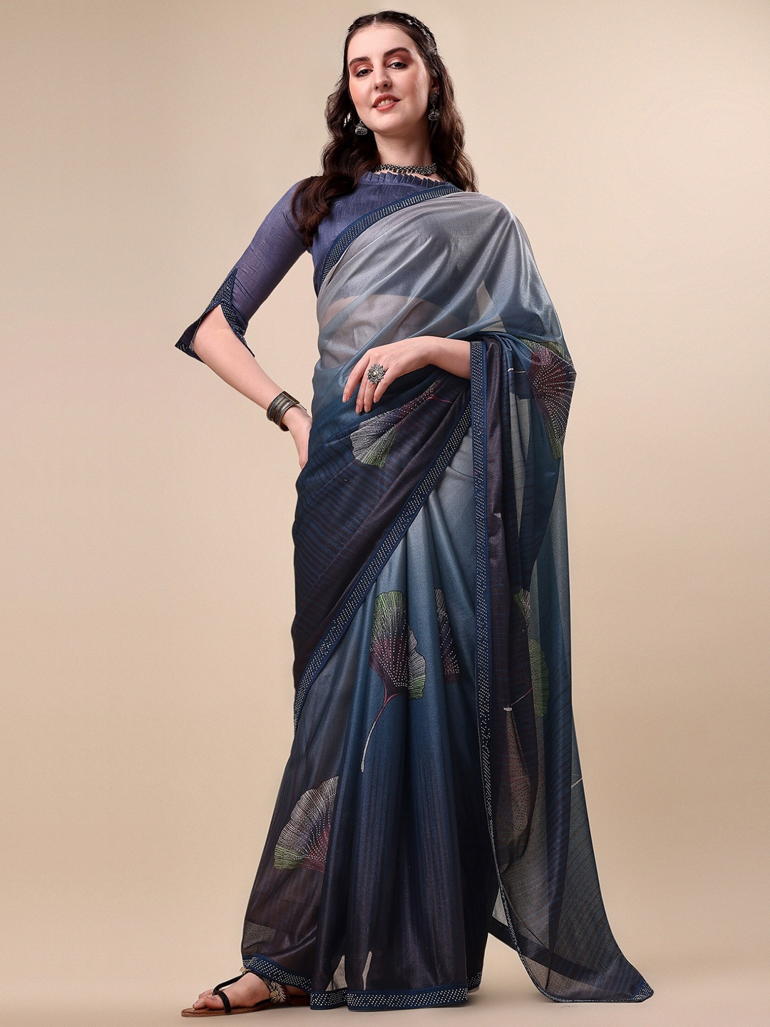 

Vaidehi Fashion Grey & Green Floral Beads and Stones Silk Blend Saree