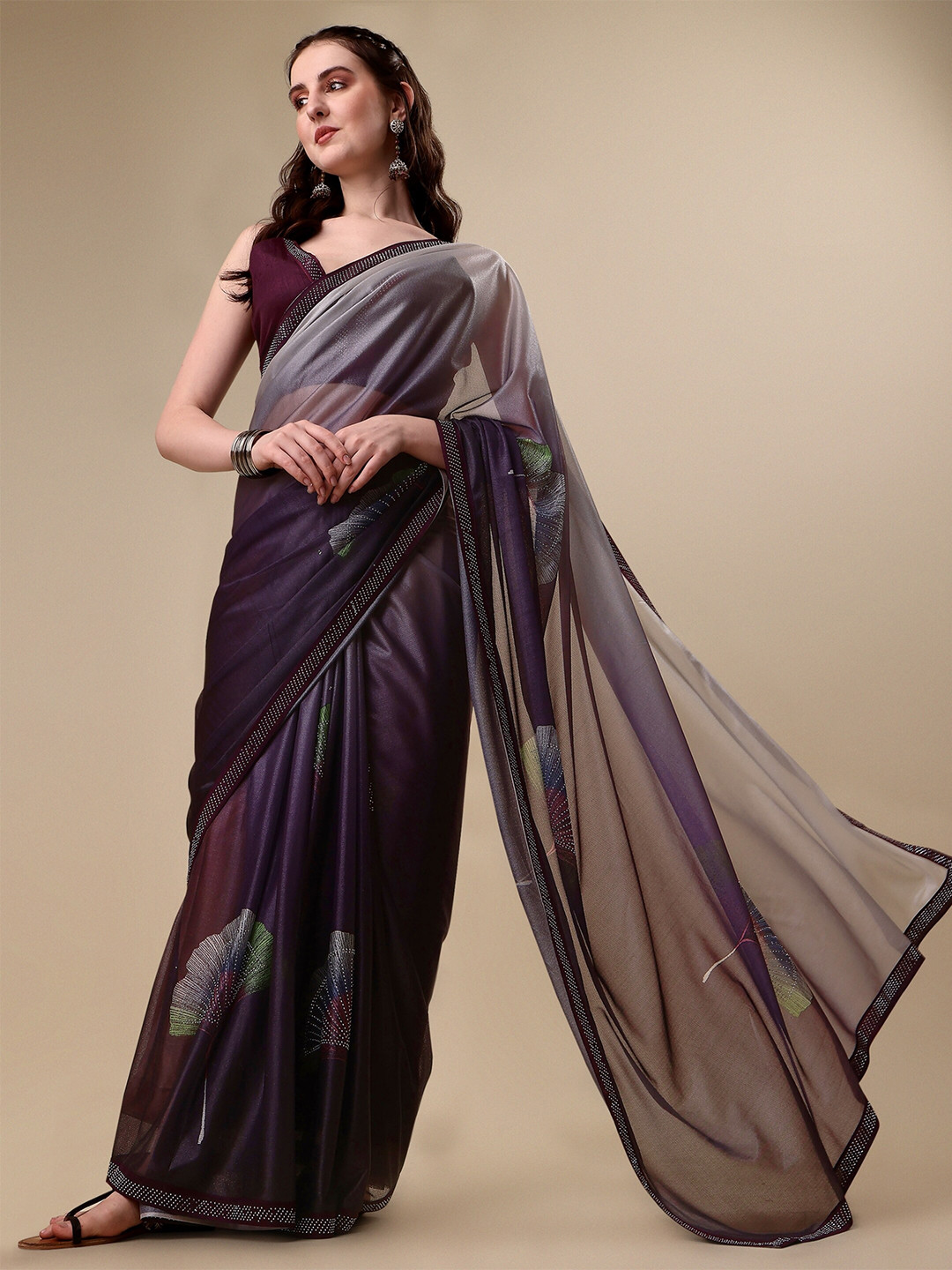 

Vaidehi Fashion Purple & Grey Floral Beads and Stones Silk Blend Saree