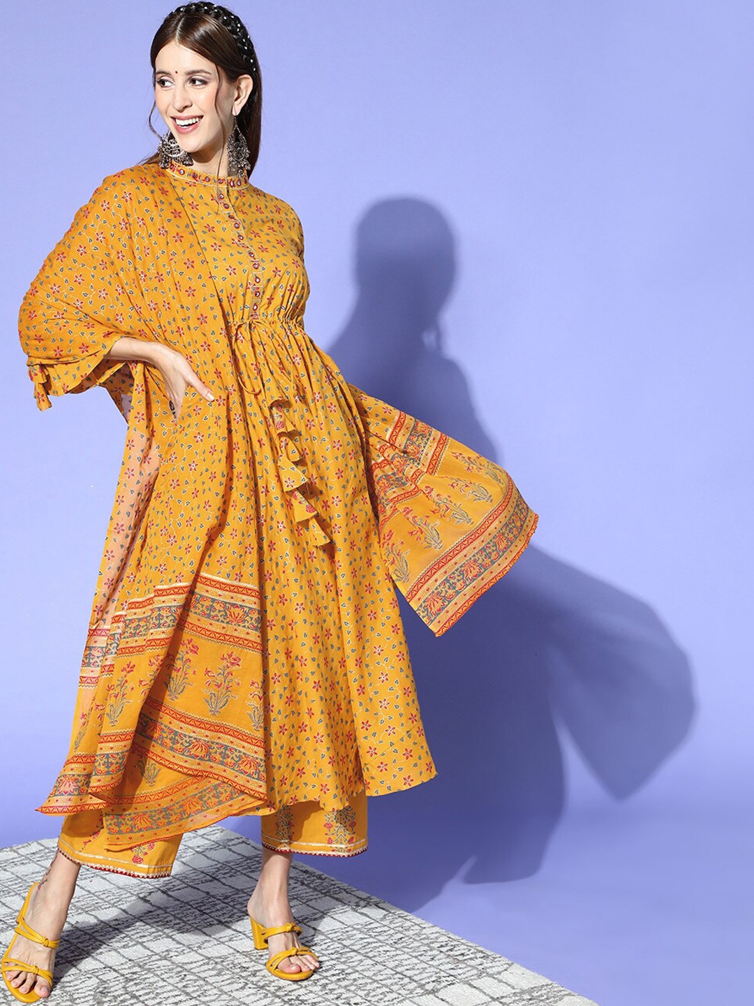 

Indo Era Women Floral Printed Mirror Work Kurta With Palazzos & Dupatta, Mustard