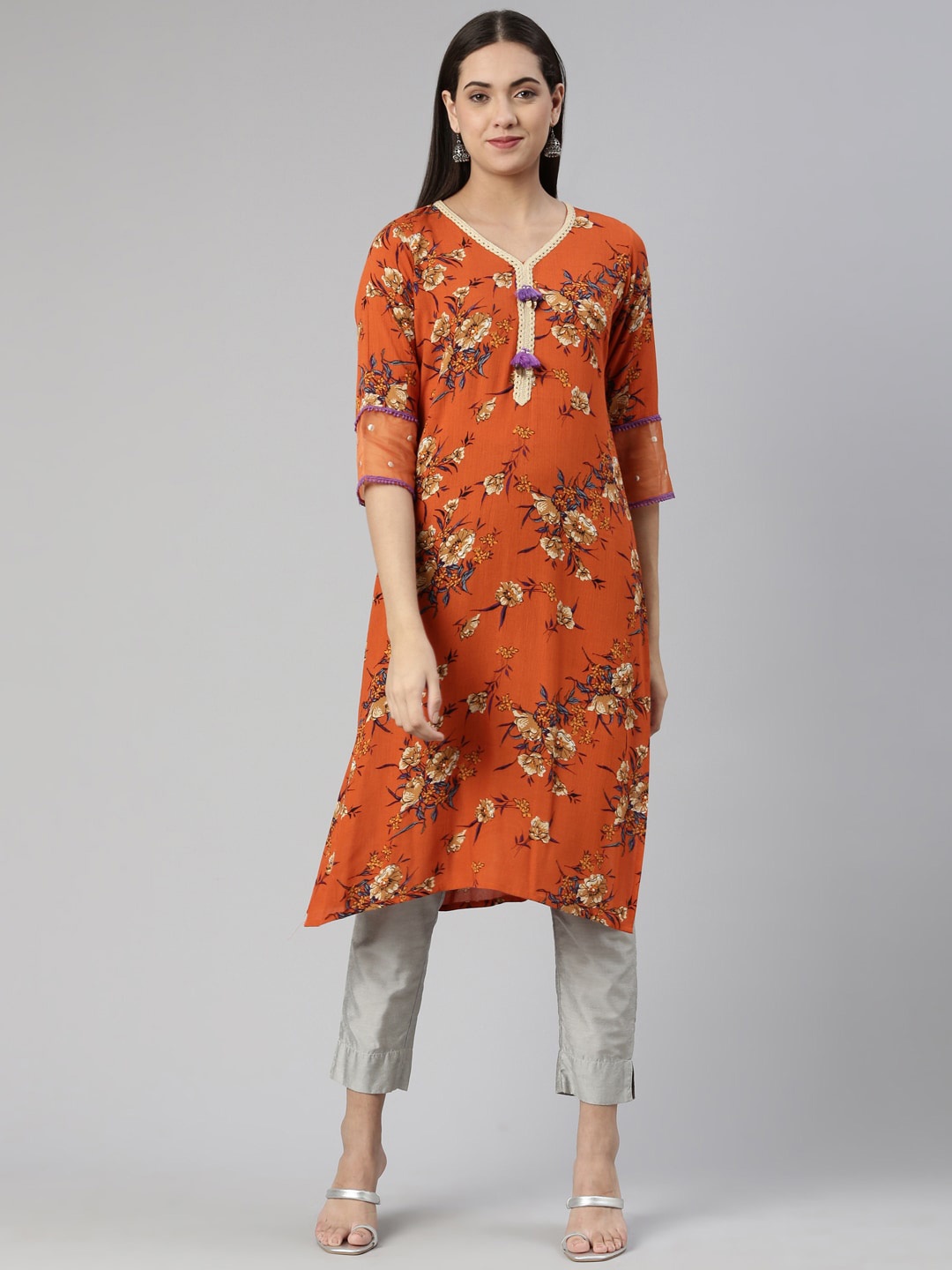 

Neerus Women Floral Printed Asymmetric Kurta, Rust