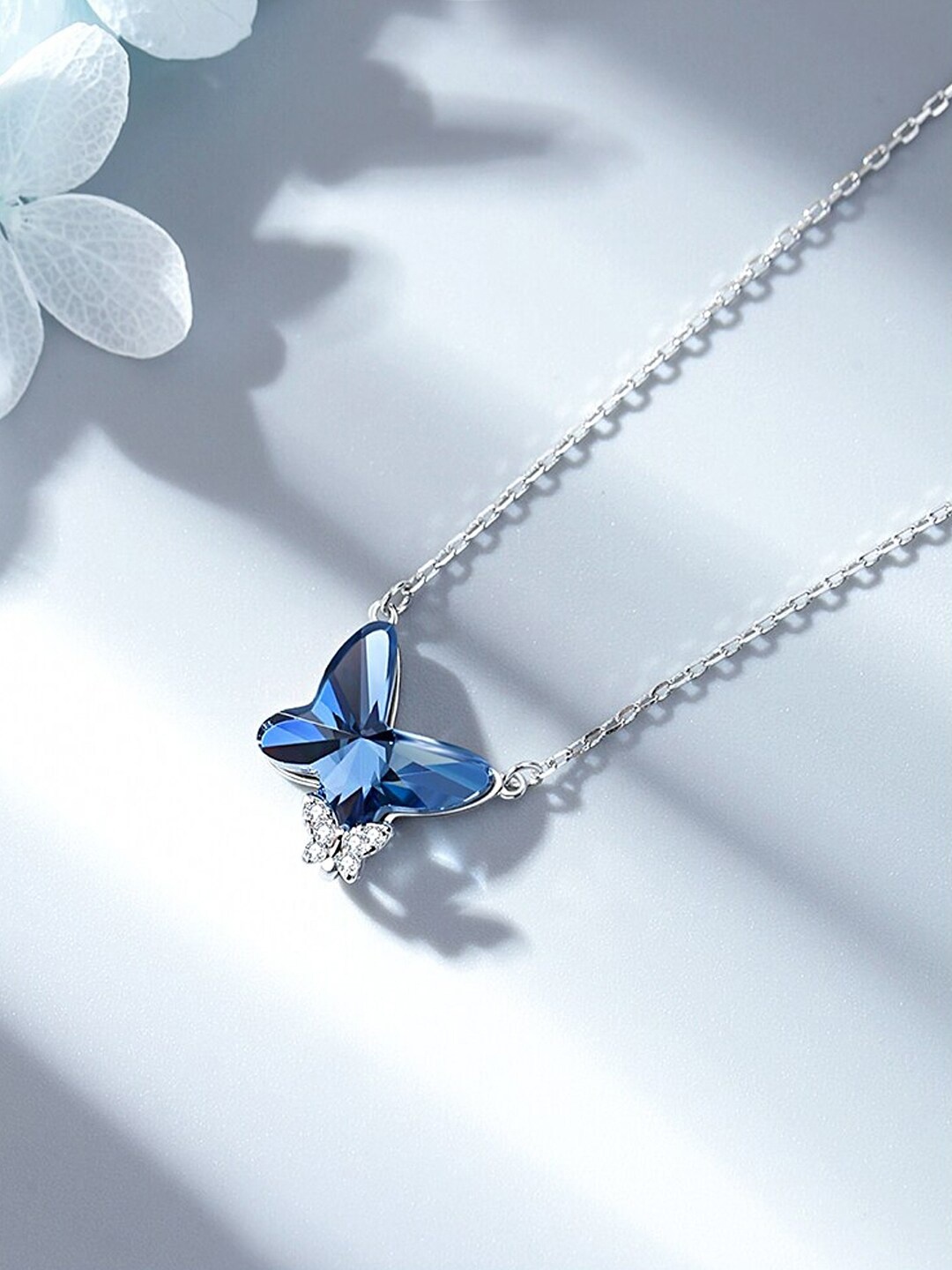 

Raajsi by Yellow Chimes Women 925 Sterling Silver-Plated Pendant With Chain, Blue