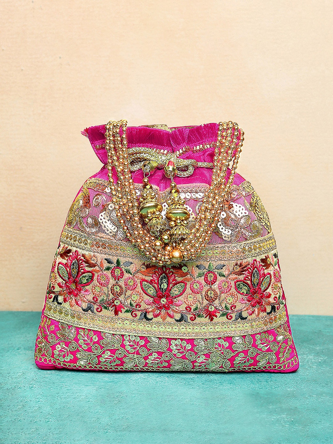 

Peora Embellished Potli Clutch, Magenta