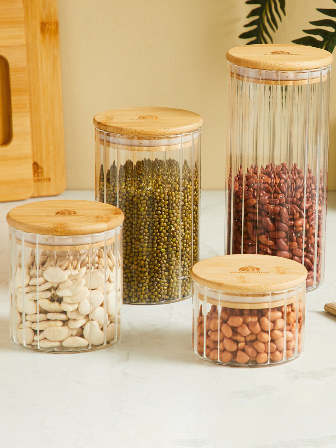 

Home Centre Spinel Transparent & Brown Textured Glass Canister With Bamboo Lid 430 ml