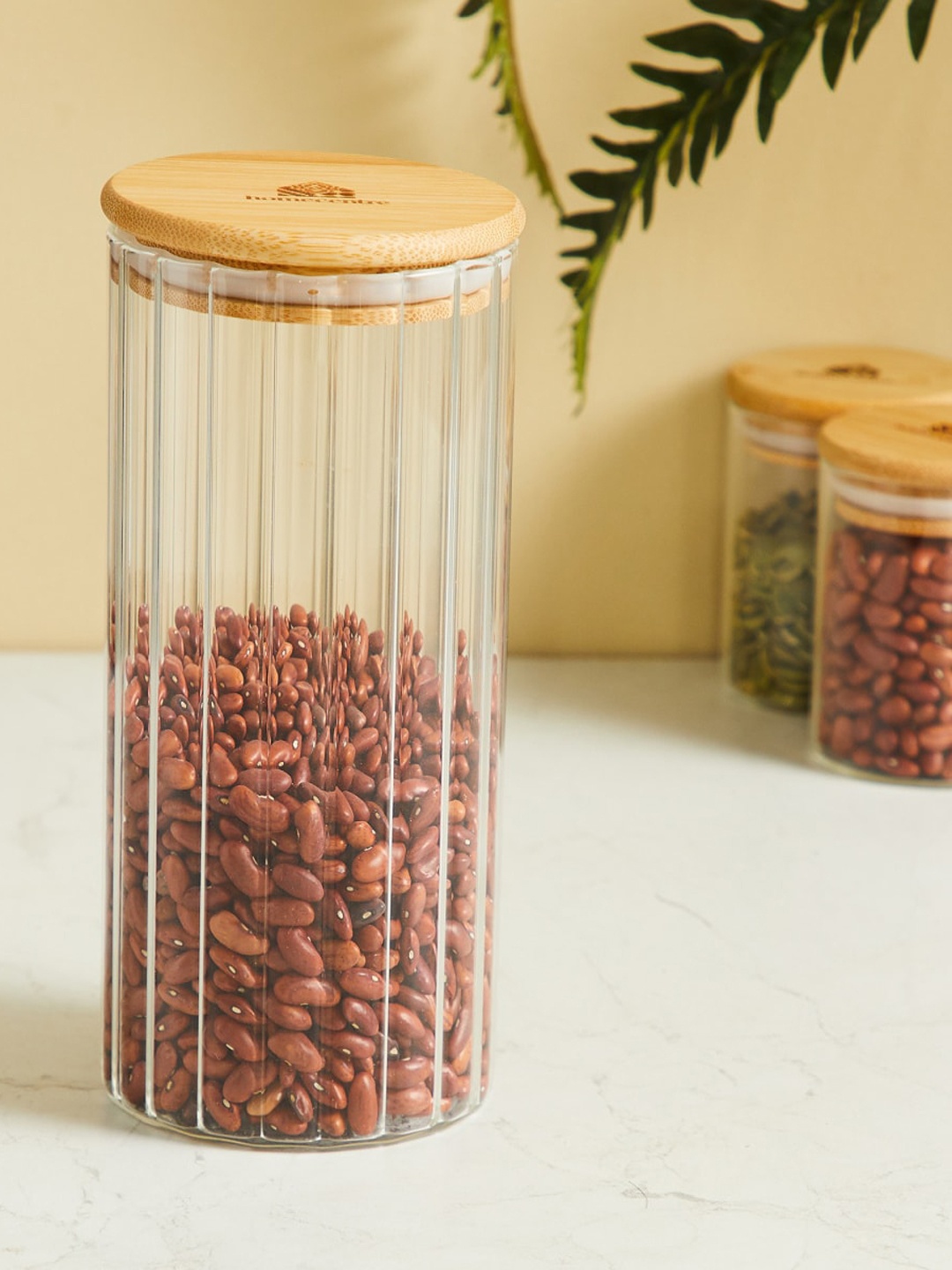 

Home Centre Spinel Transparent & Brown Textured Glass Storage Canister With Bamboo Lid 1 L