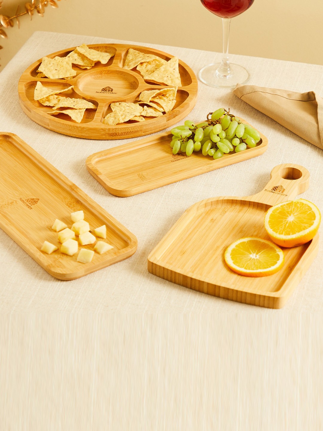 

Home Centre Spinel-Wallet Opener Brown Bamboo Rectangular Food Platter