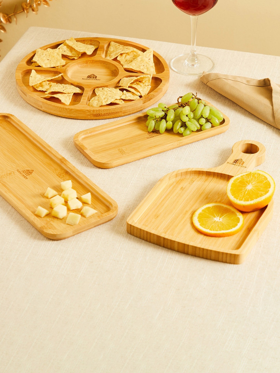

Home Centre Spinel-Wallet Opener Brown Bamboo Food Platter With Handle