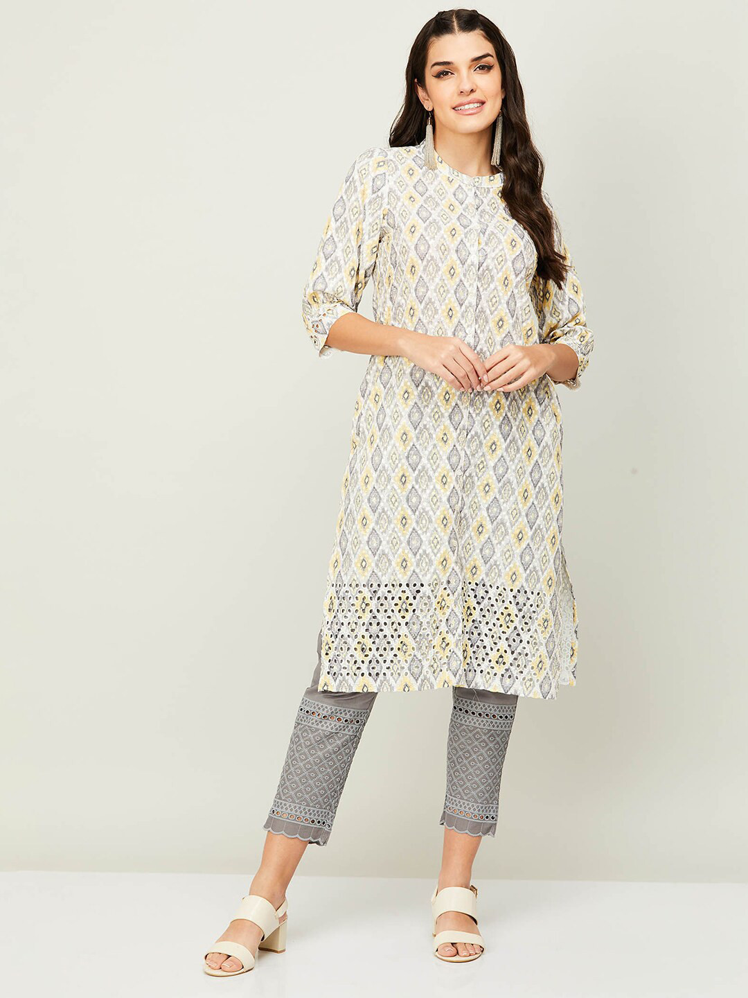 

Melange by Lifestyle Printed Pure Cotton Kurta with Trousers, Yellow