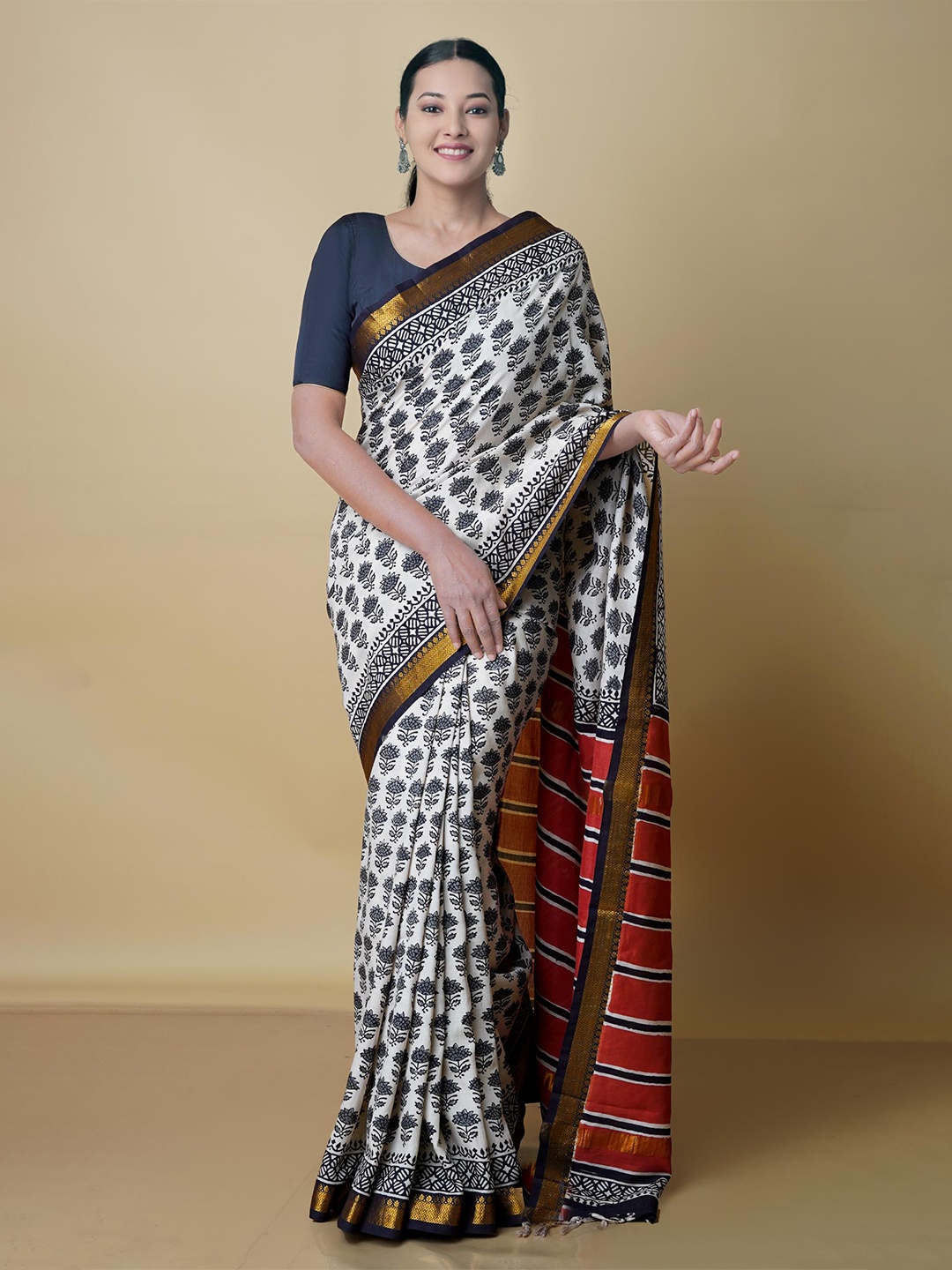 

Unnati Silks Floral Zari Silk Blend Chanderi Saree, Beige