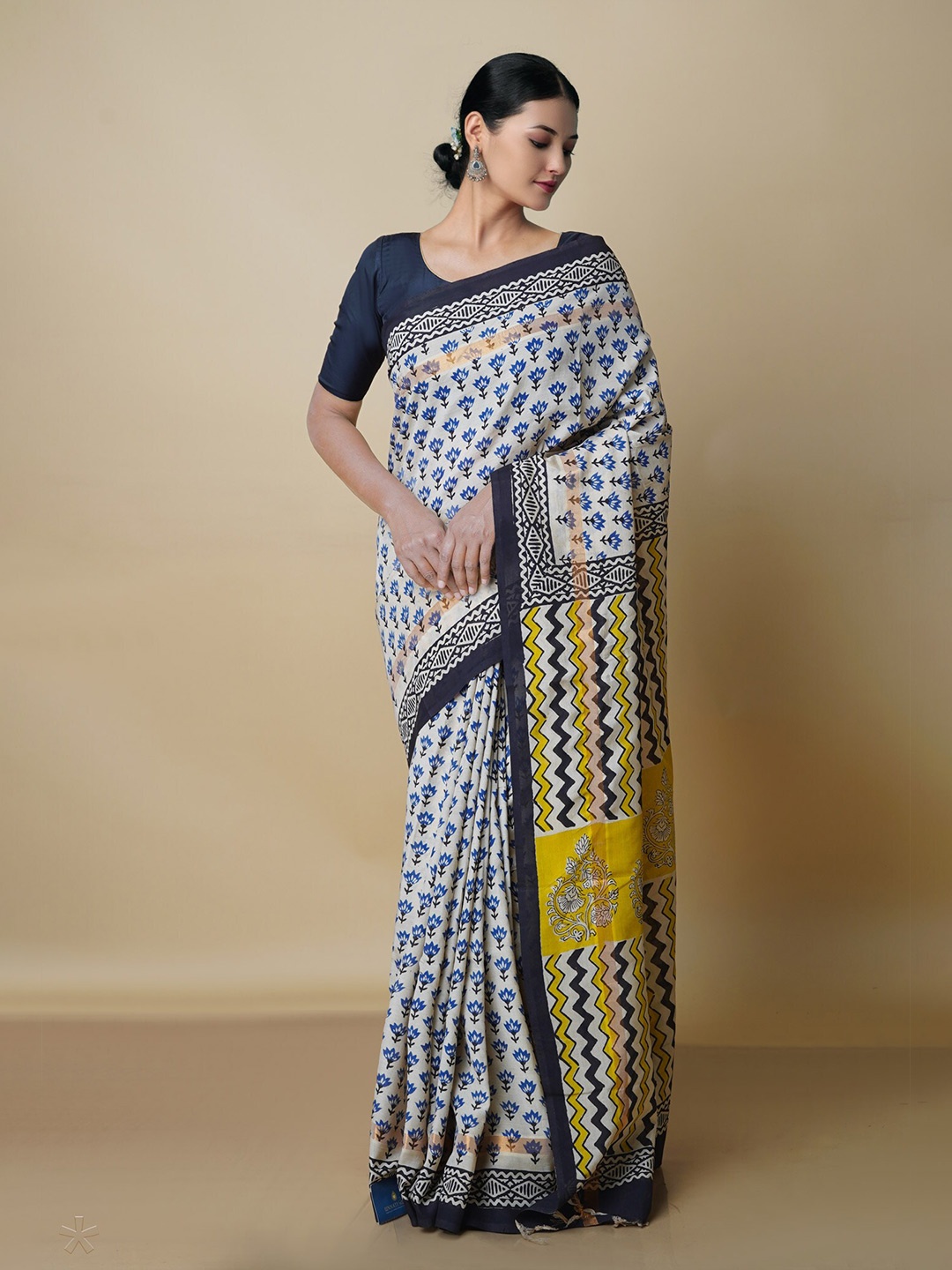 

Unnati Silks Ethnic Motifs Printed Handloom Chanderi Saree, Beige