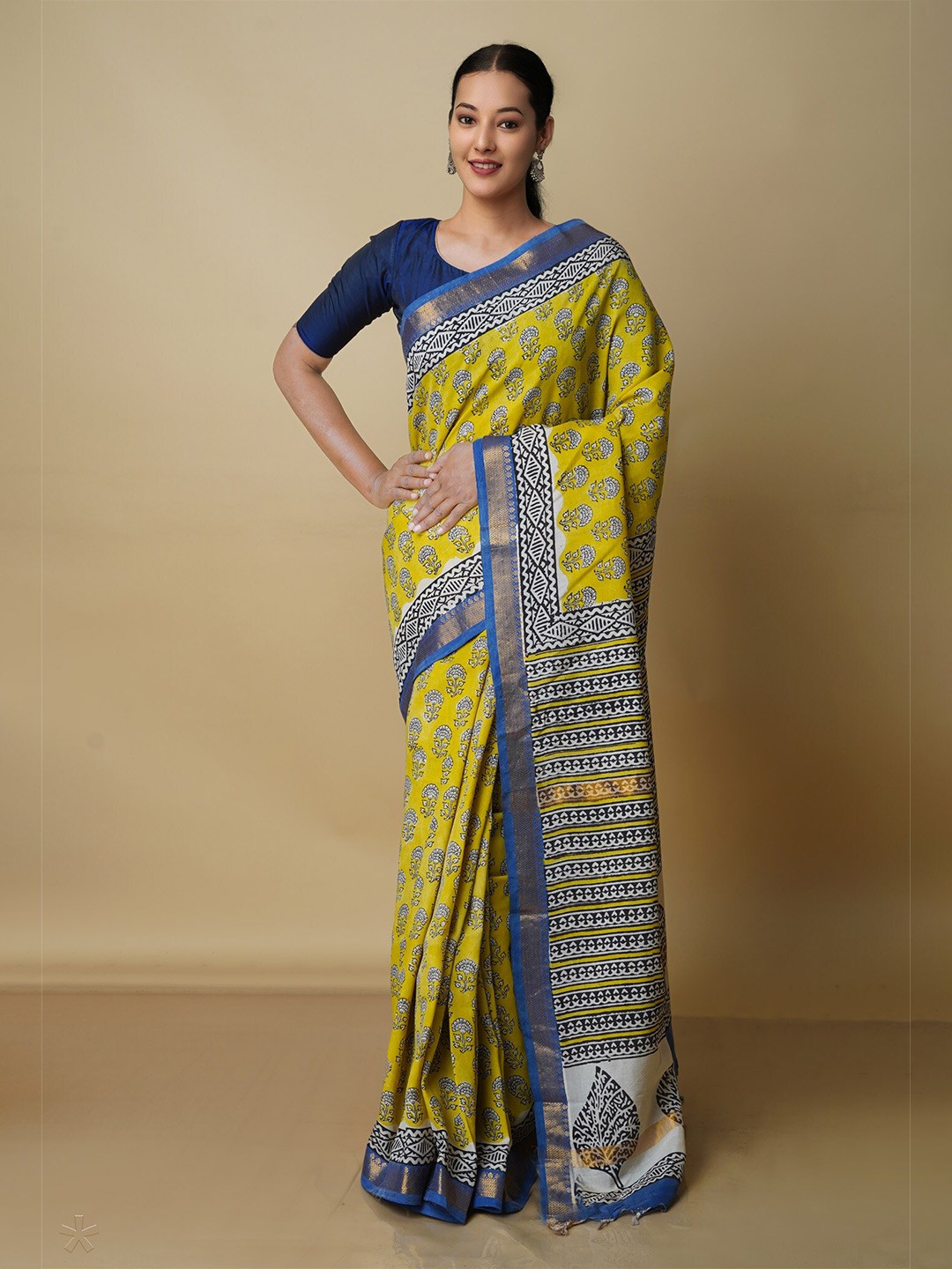 

Unnati Silks Ethnic Motifs Printed Zari Chanderi Handloom Saree, Yellow