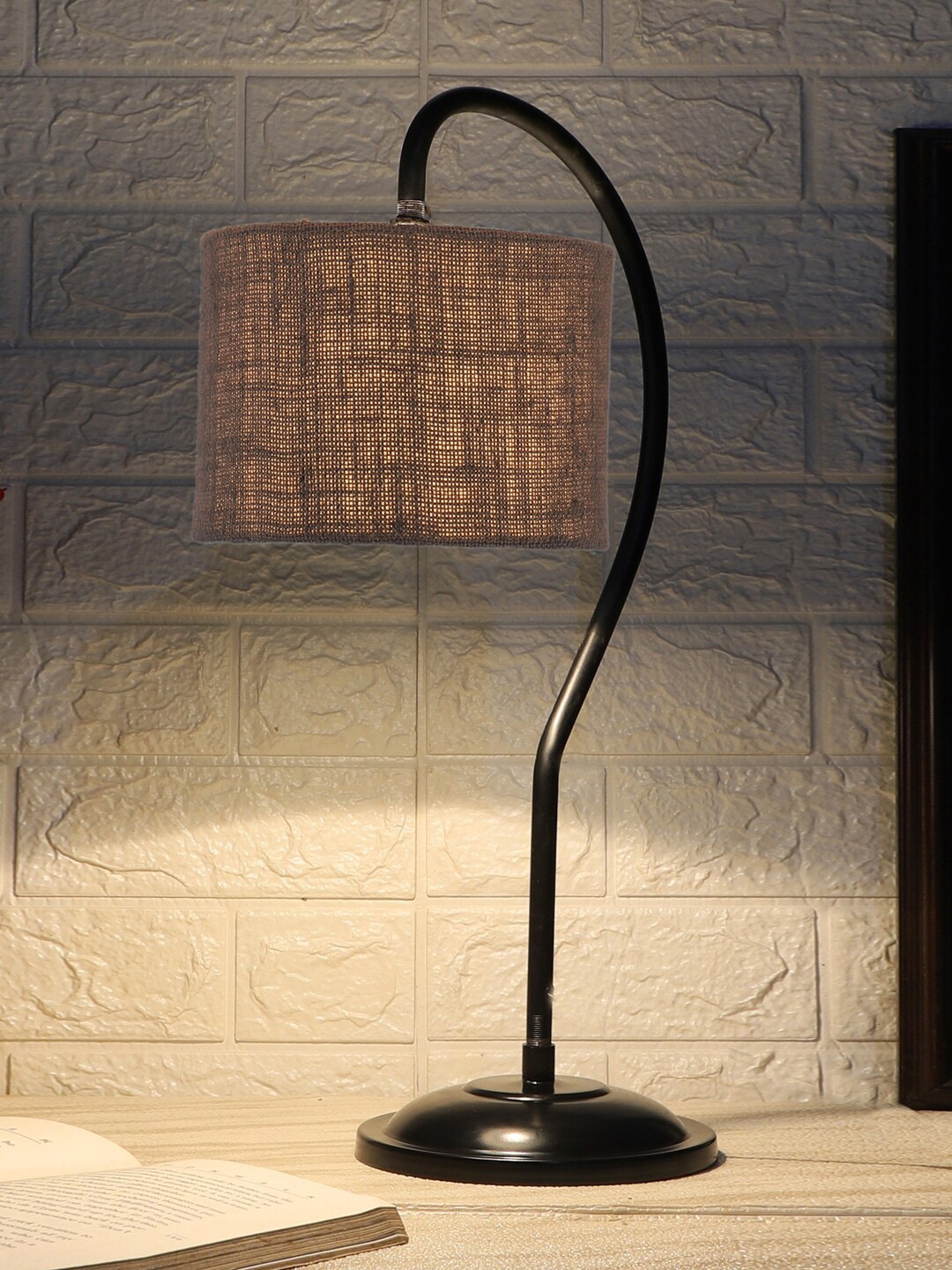

Devansh Grey & Black Textured Jute Curvy Table Lamp With Iron Base