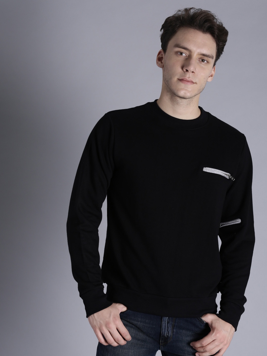 

Kook N Keech Men Black Solid Sweatshirt