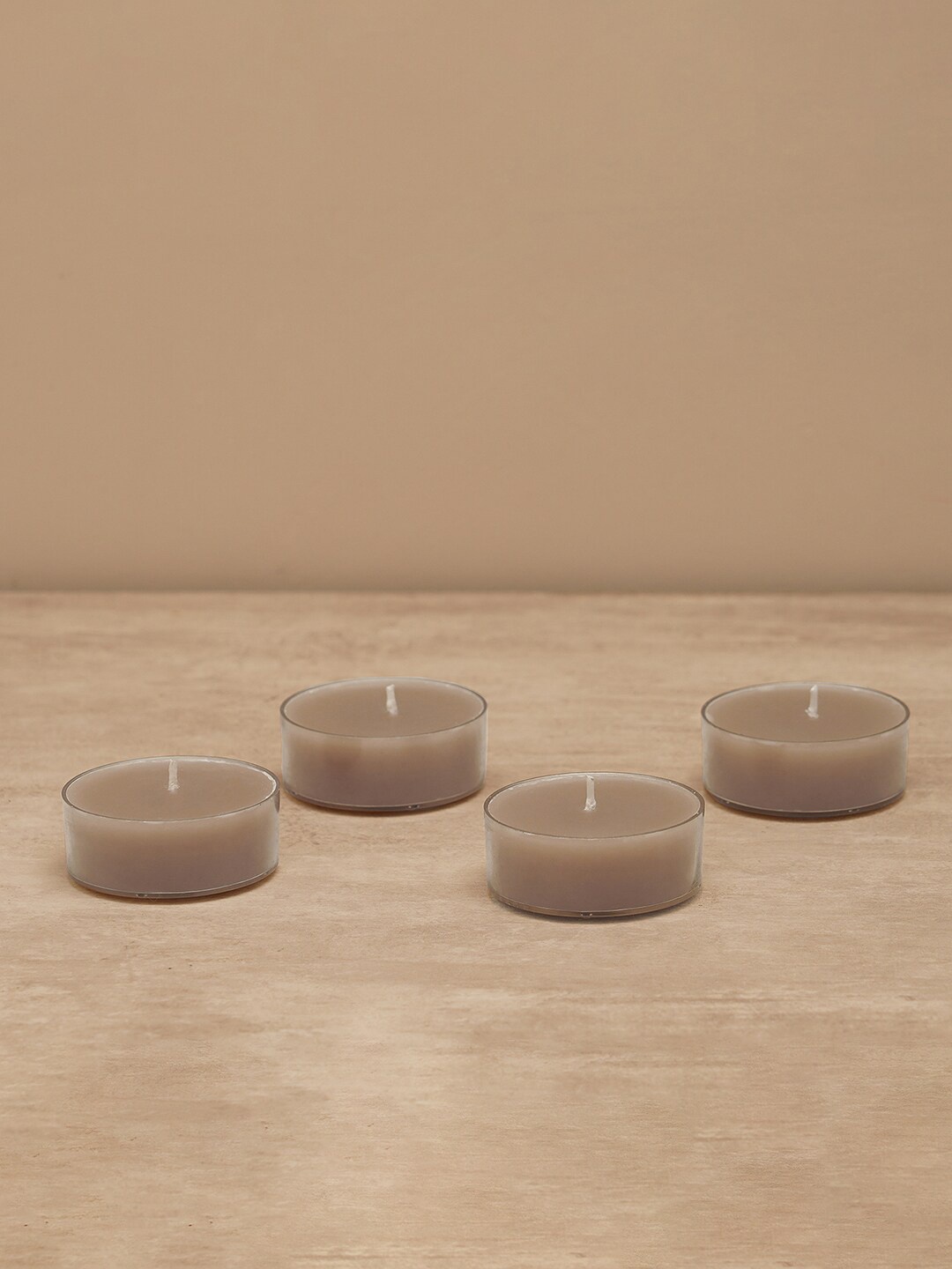 

Pure Home and Living 4 Pcs Beige Lavender & Chamomile Fragrance Tea Light Candles Large