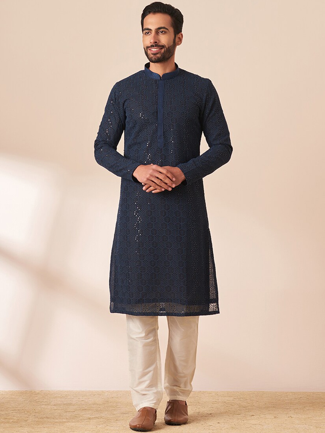 

Manyavar Men Embroidered Mirror Work Kurta with Trousers, Navy blue